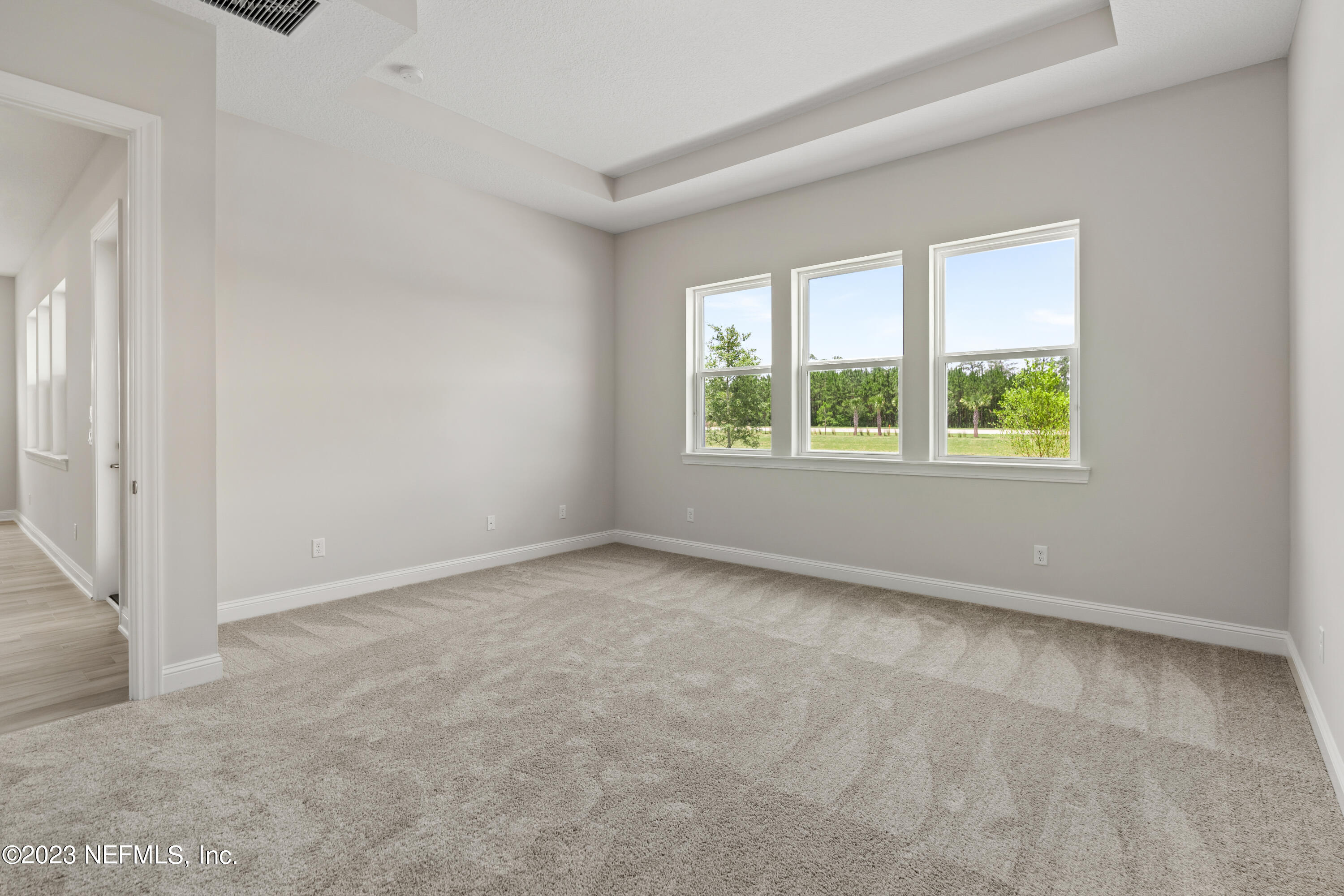 78 Clearview Drive St. Augustine, FL 32092 - Photo 15 of 61 an empty room with windows