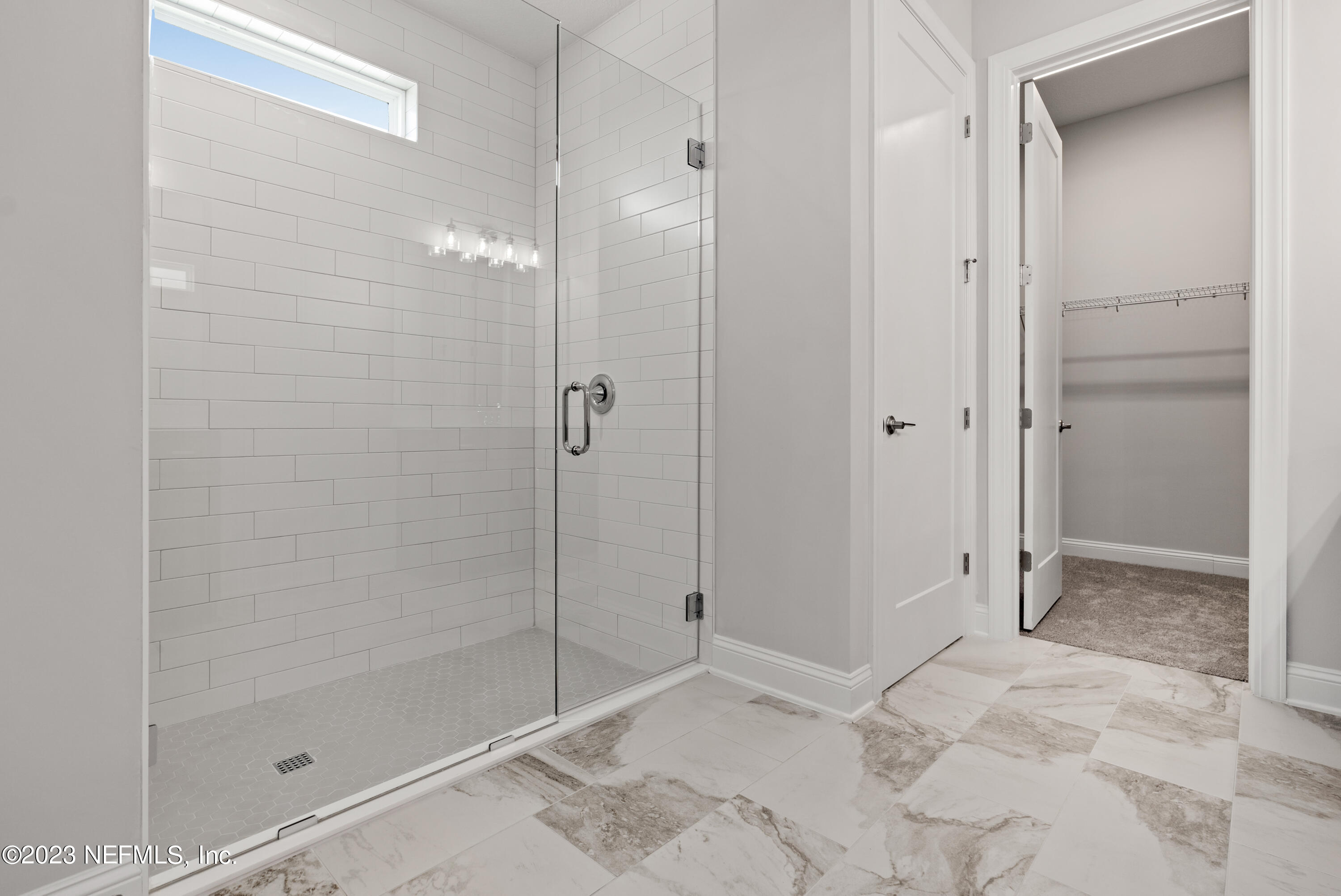 78 Clearview Drive St. Augustine, FL 32092 - Photo 18 of 61 a bathroom with a shower and a sink