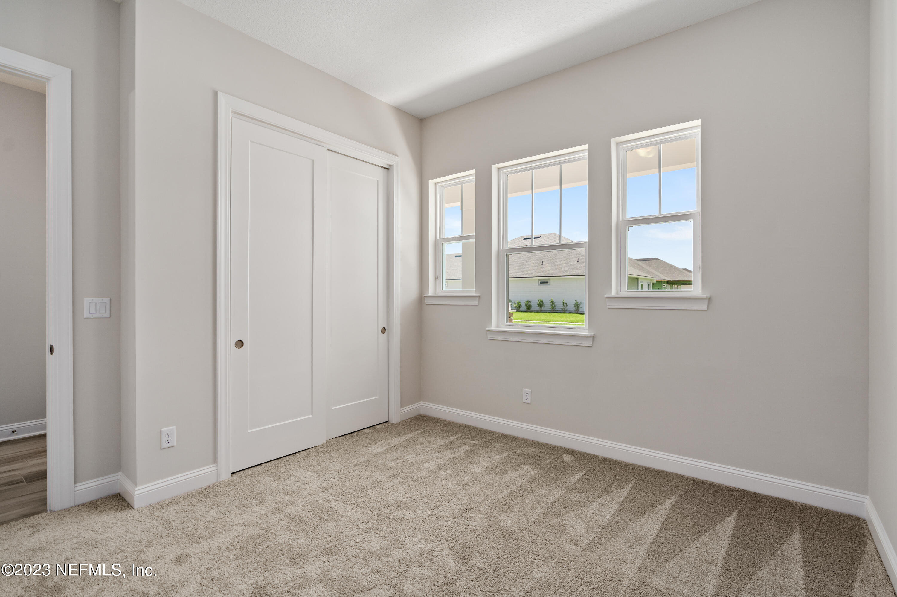 78 Clearview Drive St. Augustine, FL 32092 - Photo 21 of 61 an empty room with windows