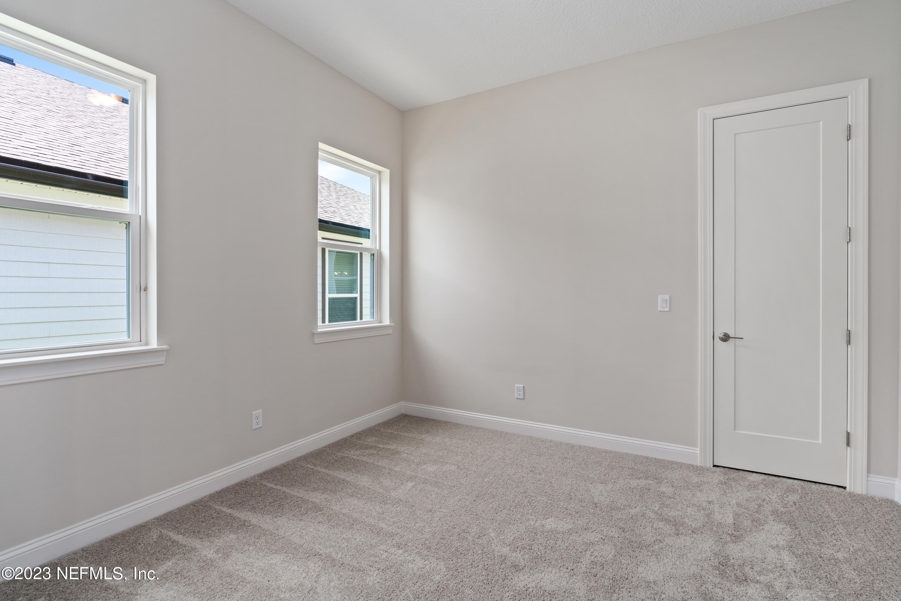78 Clearview Drive St. Augustine, FL 32092 - Photo 22 of 61 a view of an empty room with closet and a window