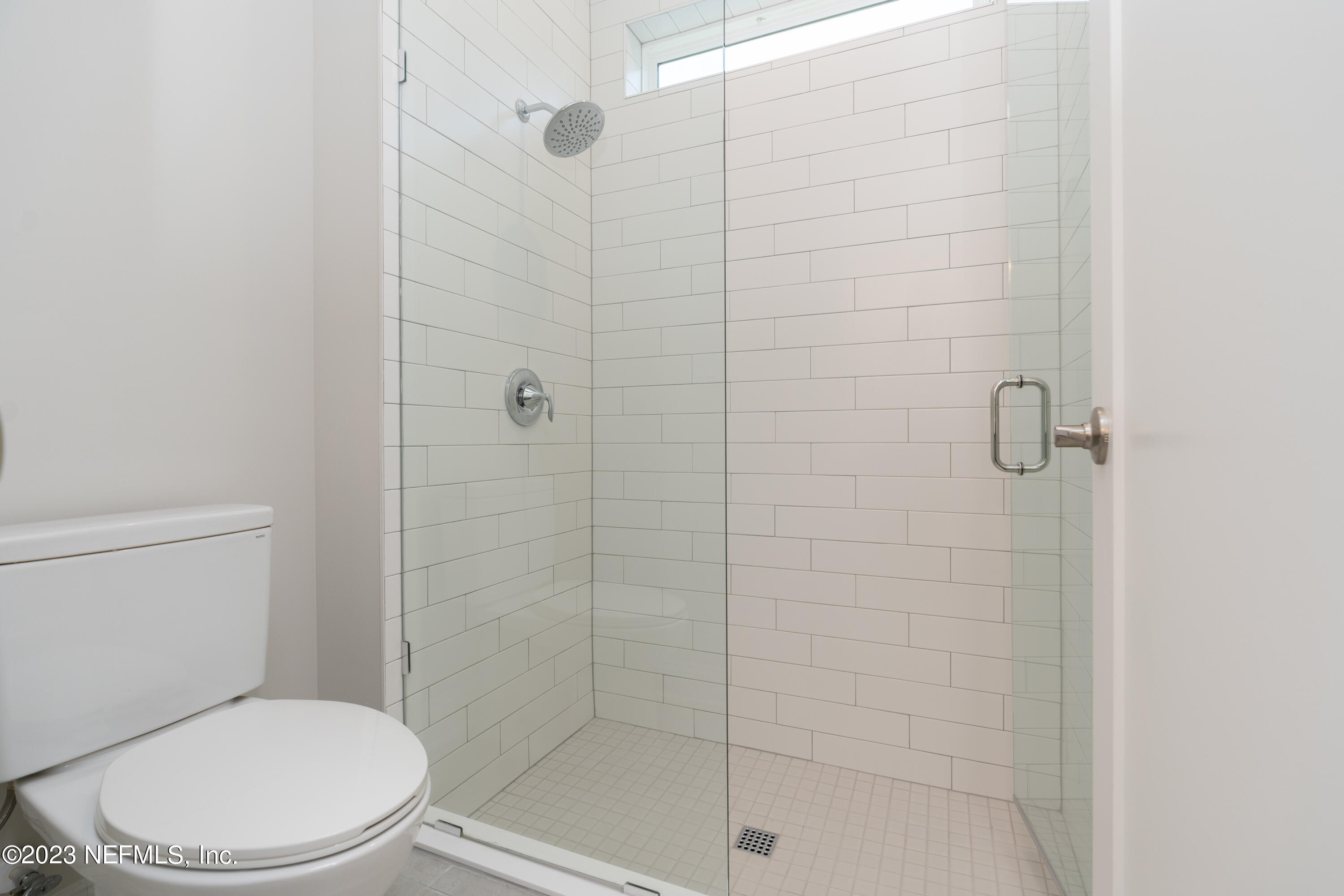 78 Clearview Drive St. Augustine, FL 32092 - Photo 25 of 61 a white toilet next to a bathroom