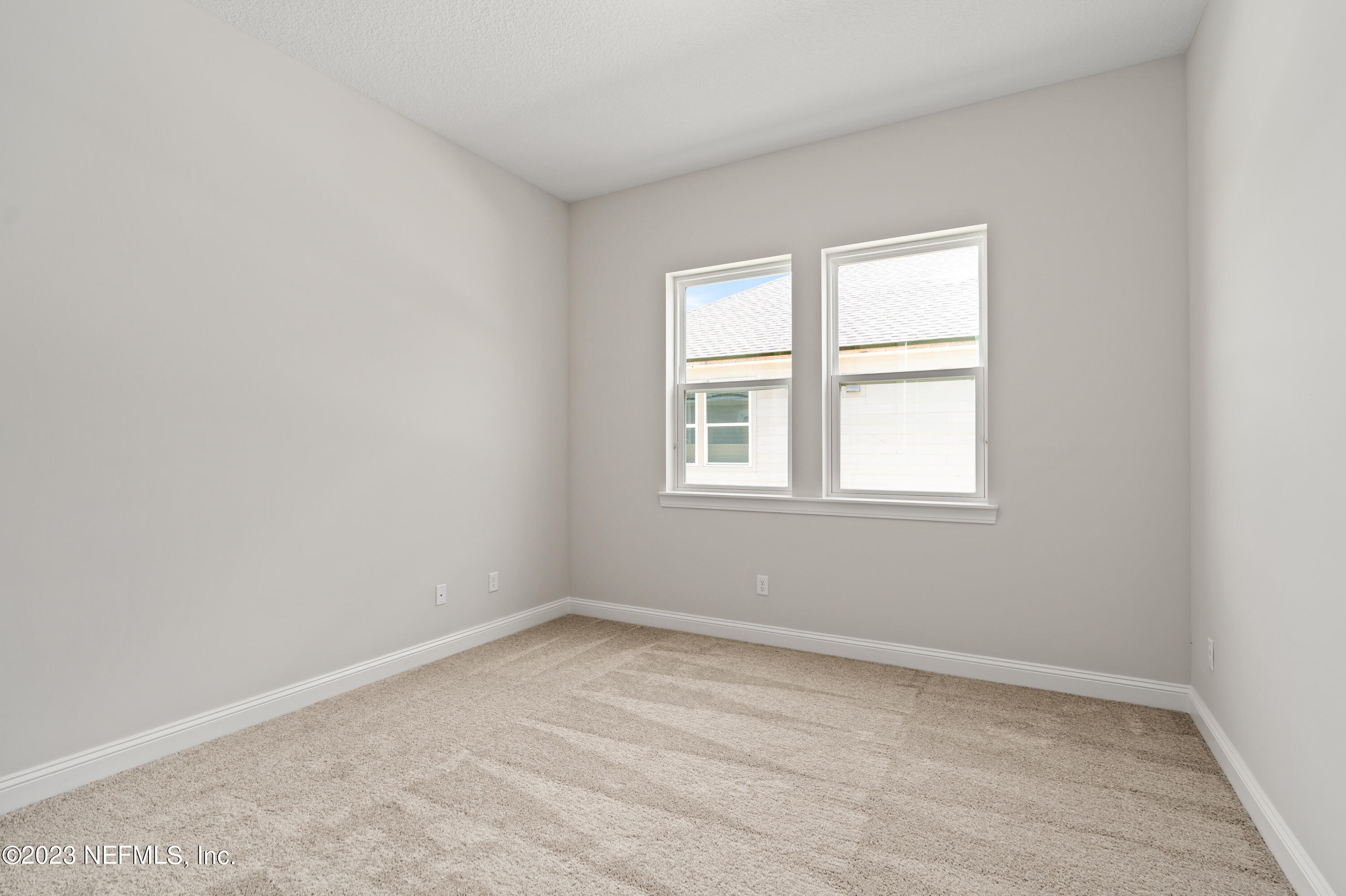 78 Clearview Drive St. Augustine, FL 32092 - Photo 26 of 61 an empty room with a window