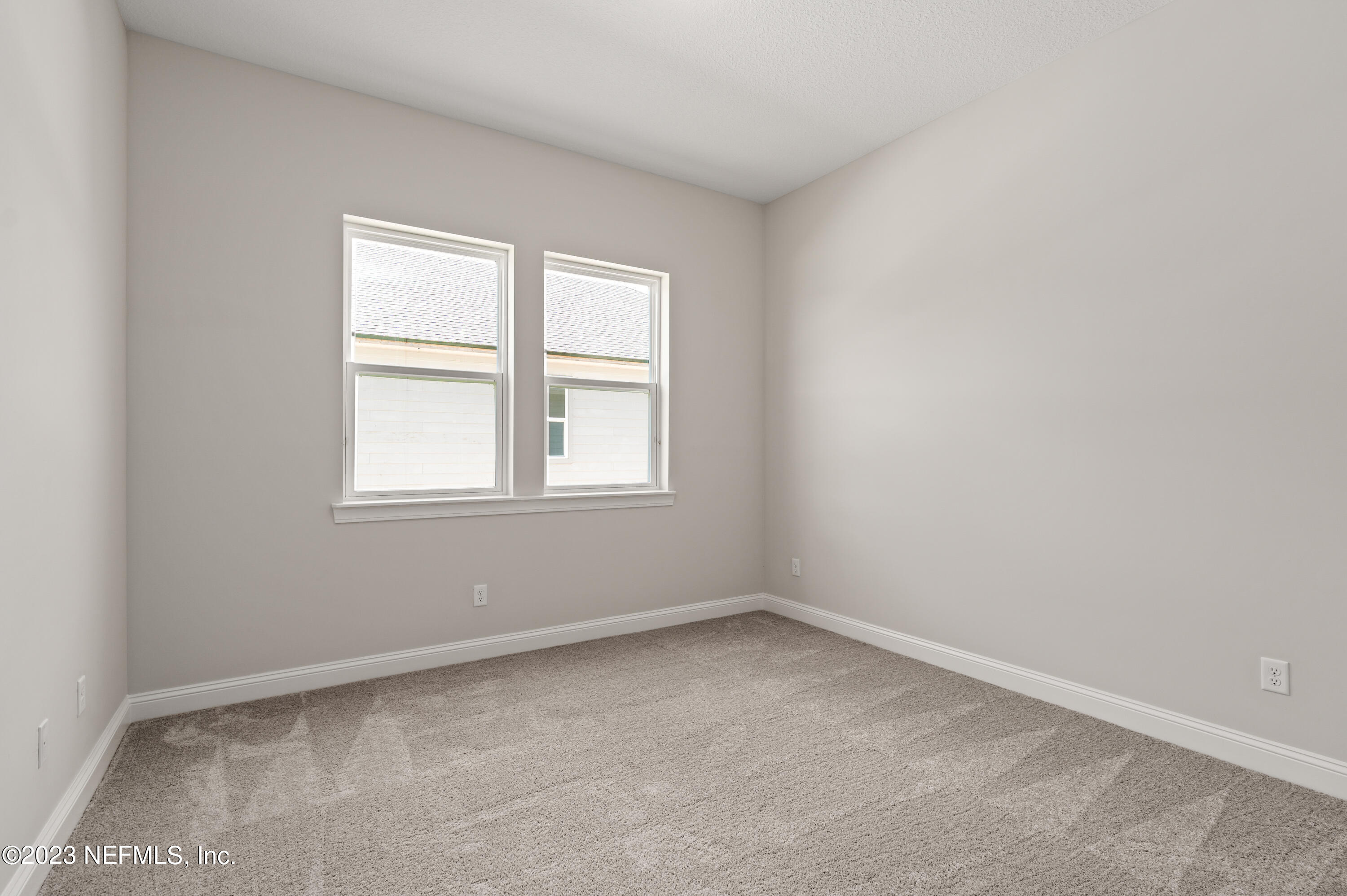 78 Clearview Drive St. Augustine, FL 32092 - Photo 27 of 61 an empty room with a window