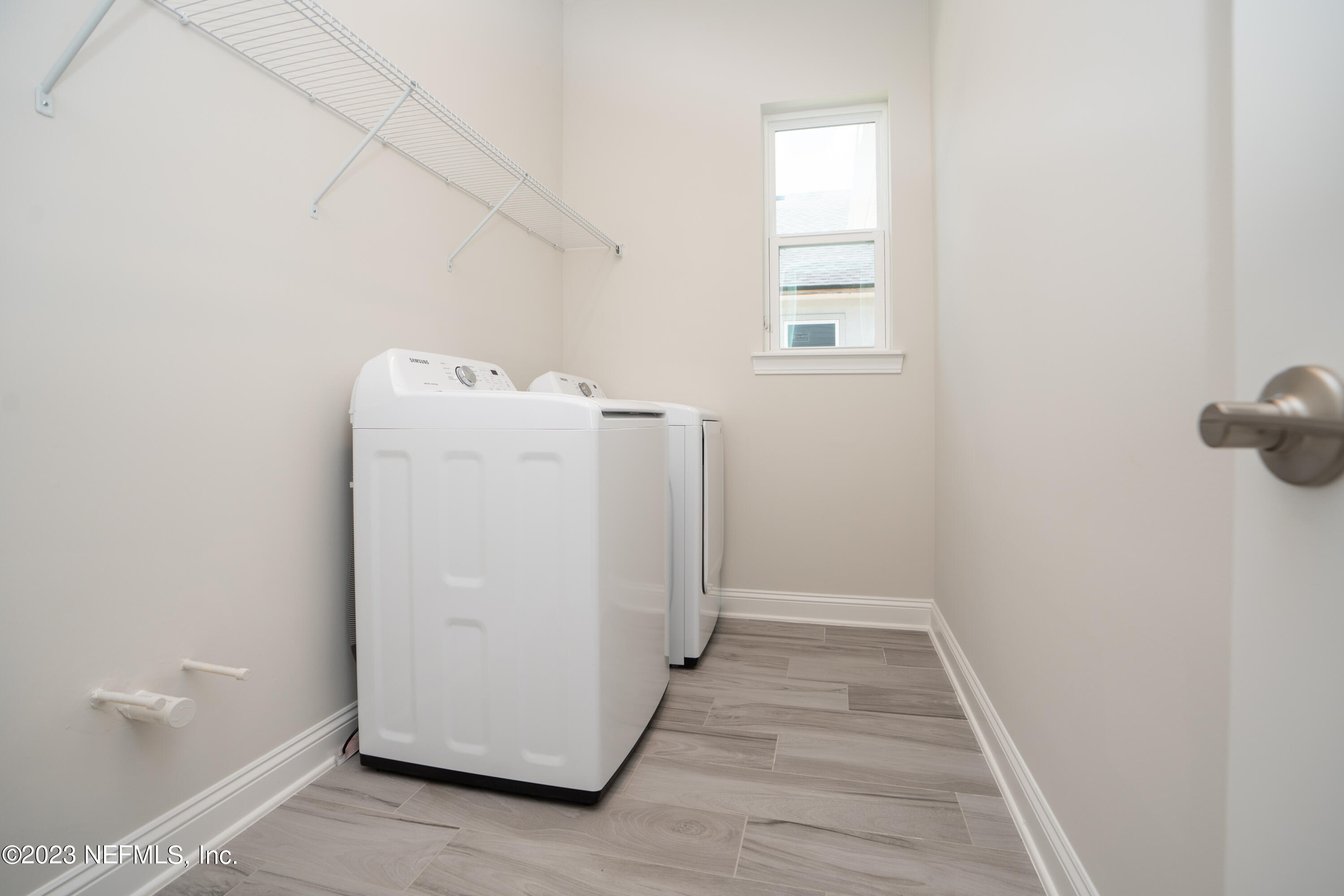 78 Clearview Drive St. Augustine, FL 32092 - Photo 30 of 61 a utility room with dryer and washer