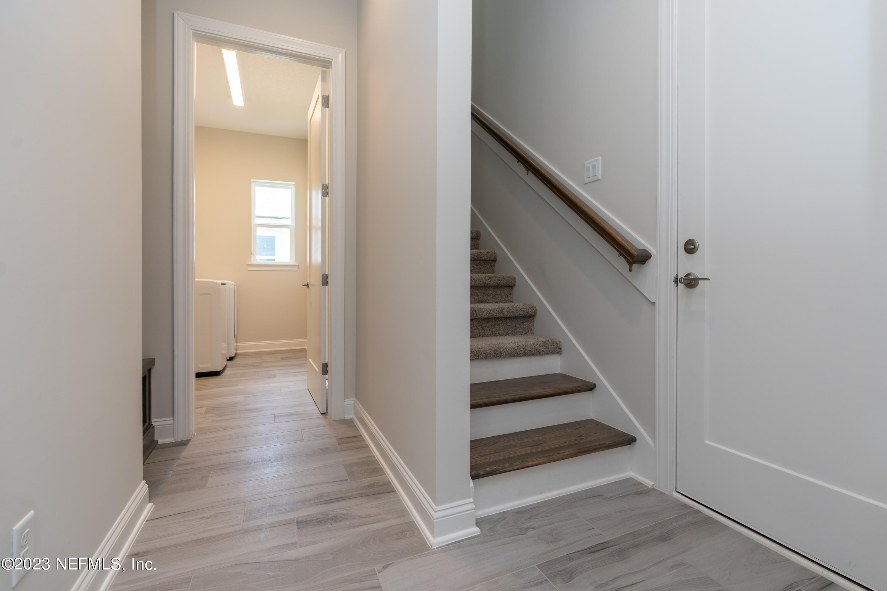 78 Clearview Drive St. Augustine, FL 32092 - Photo 31 of 61 a view of a hallway with wooden floor and entryway