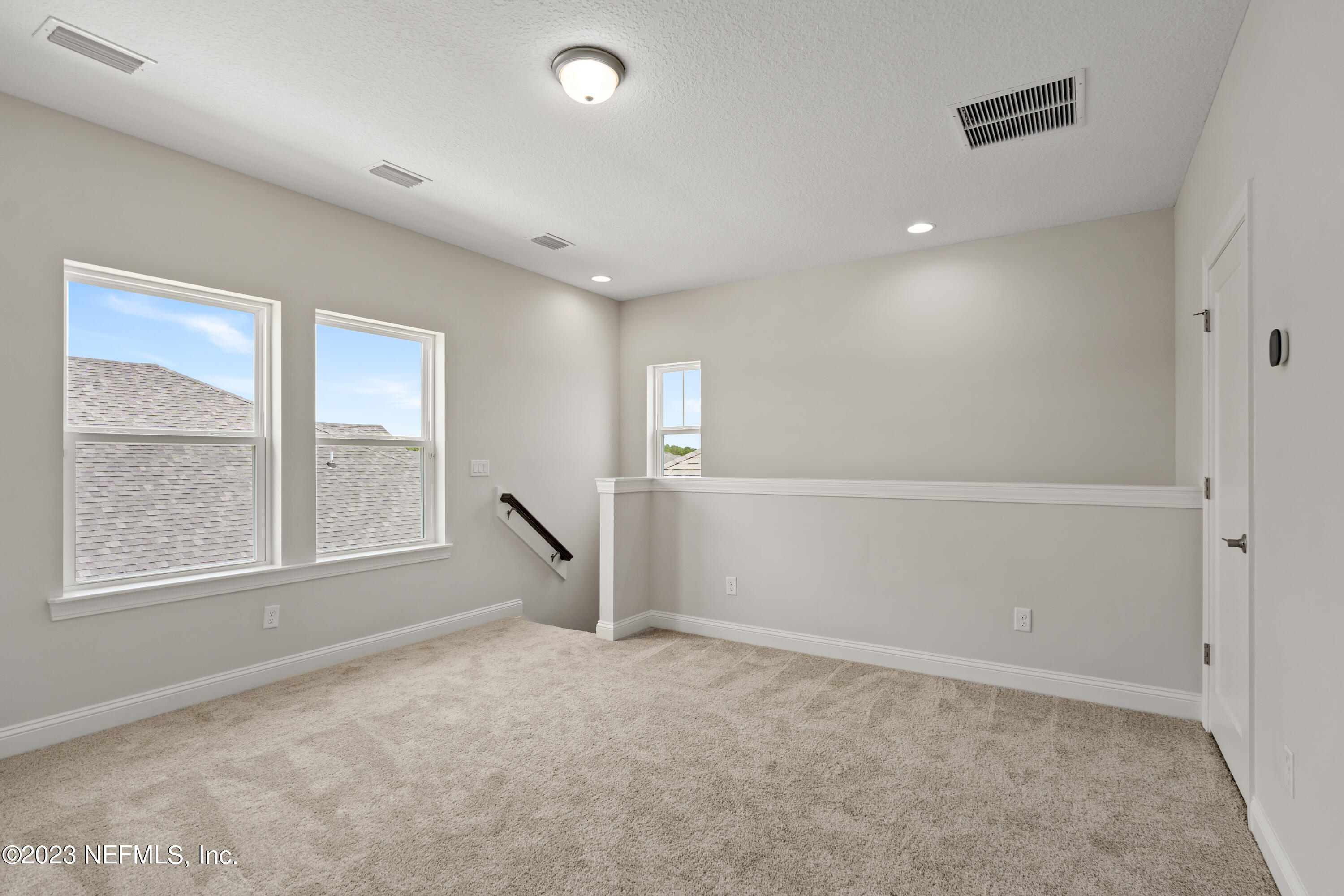 78 Clearview Drive St. Augustine, FL 32092 - Photo 33 of 61 an empty room with windows and closet