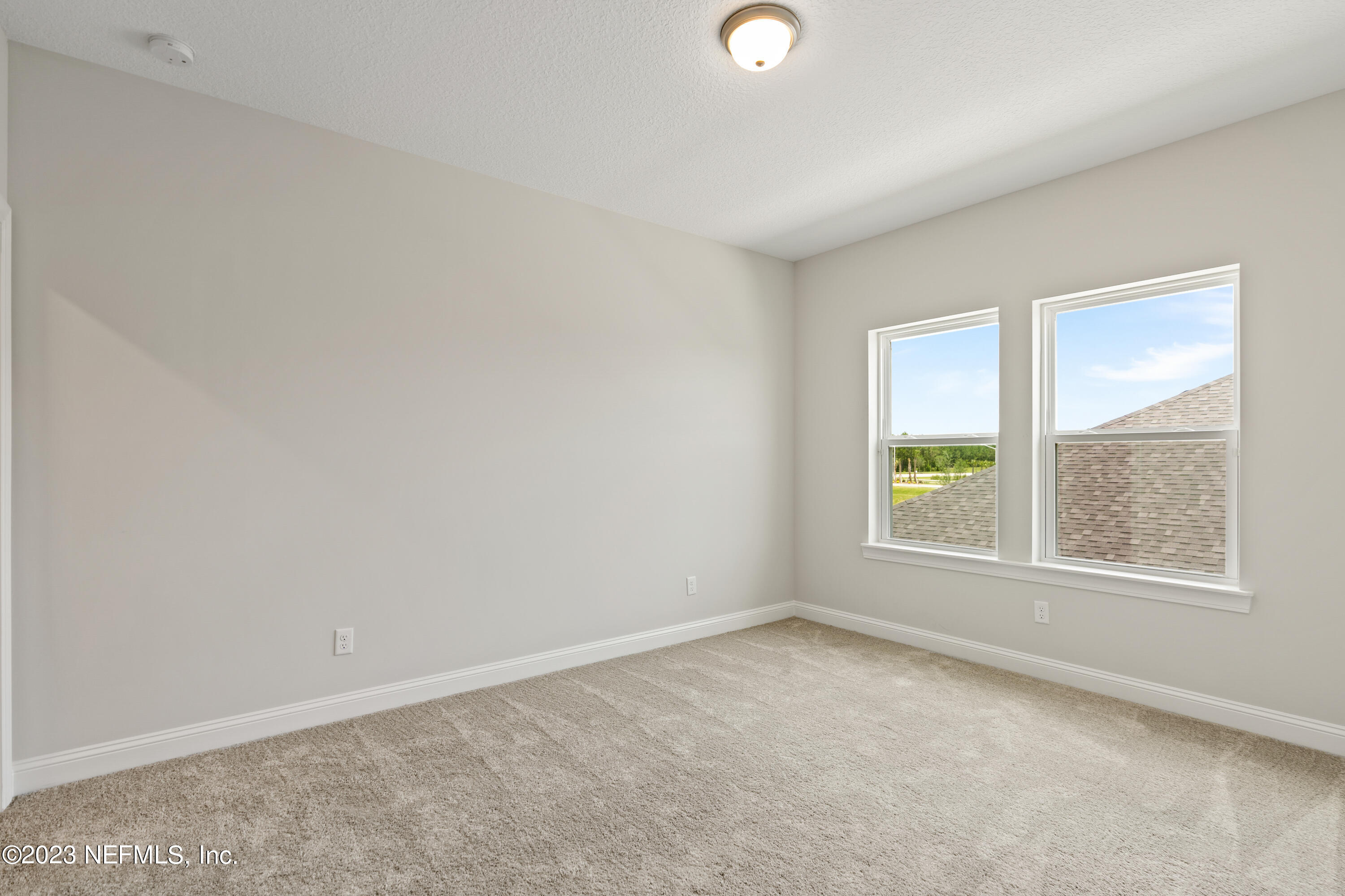 78 Clearview Drive St. Augustine, FL 32092 - Photo 34 of 61 an empty room with windows