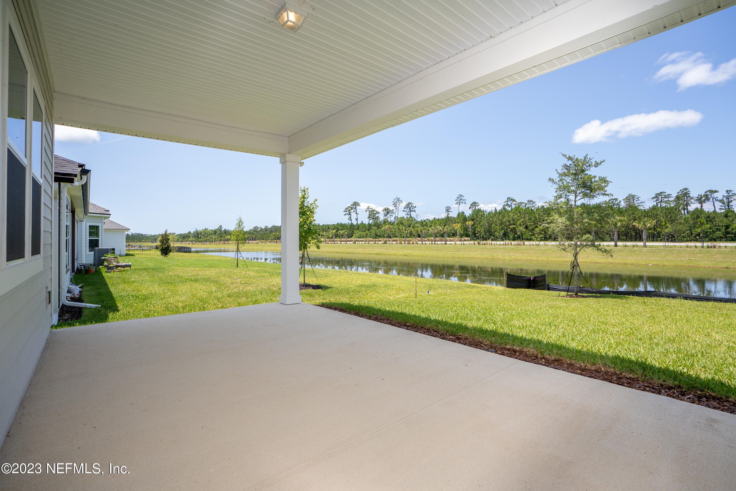 78 Clearview Drive St. Augustine, FL 32092 - Photo 4 of 61 a view of a lake with a big yard