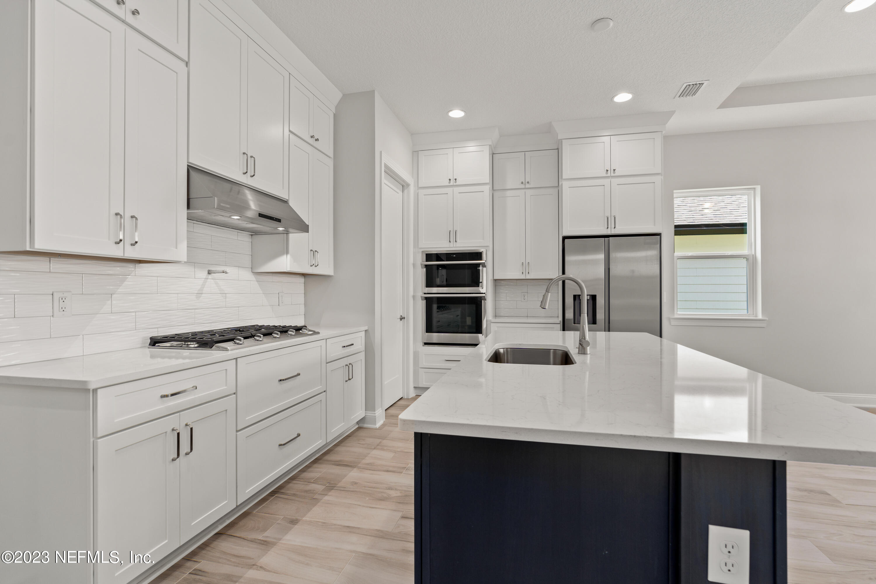 78 Clearview Drive St. Augustine, FL 32092 - Photo 7 of 61 a kitchen with stainless steel appliances a sink stove and refrigerator