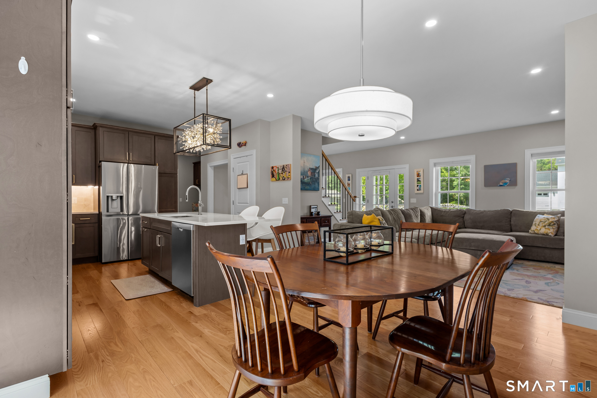 2 Martys Way Gales Ferry, CT 06335 - Photo 6 of 40 a view of a dining room with furniture and wooden floor