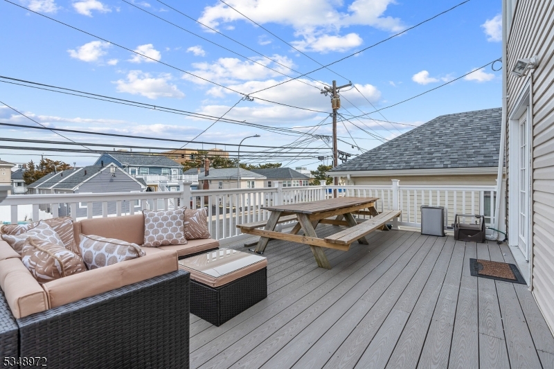 129 Franklin Avenue, Unit A Seaside Heights, NJ 08751 - Photo 12 of 14 a roof deck view with a seating space