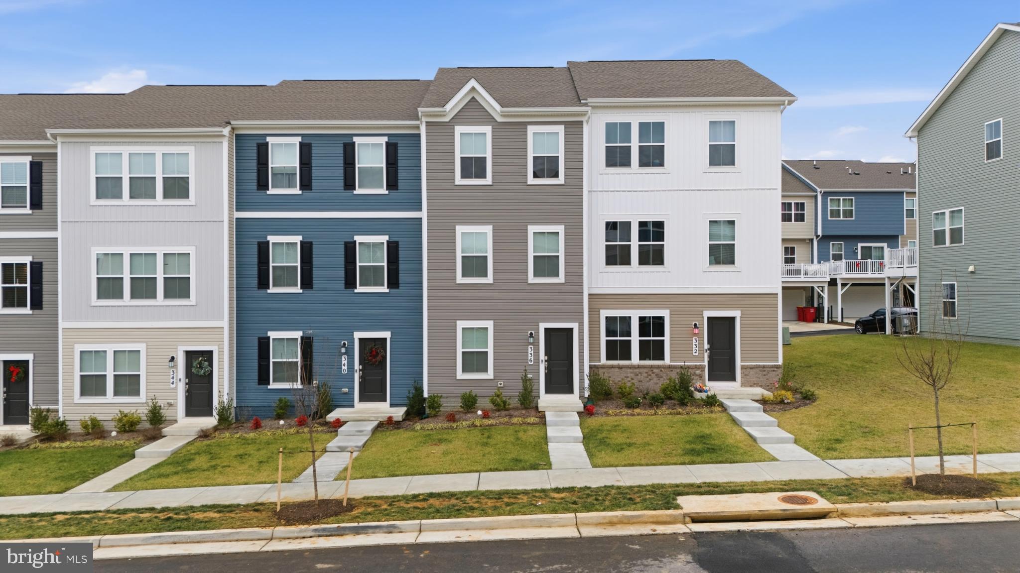 336 Mineral Springs Road Ranson, WV 25438 - Photo 2 of 38 Charming townhomes with modern facades.