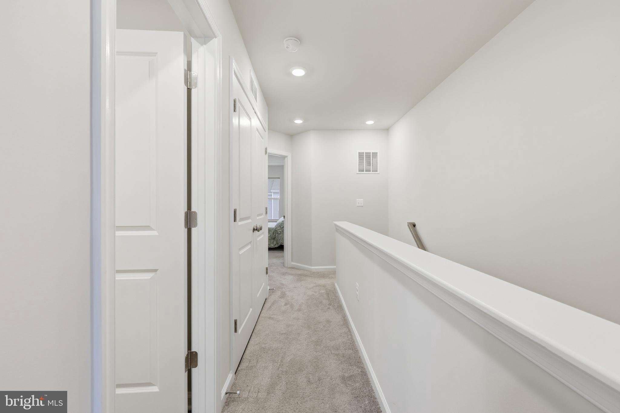336 Mineral Springs Road Ranson, WV 25438 - Photo 26 of 41 a view of a hallway with white walls