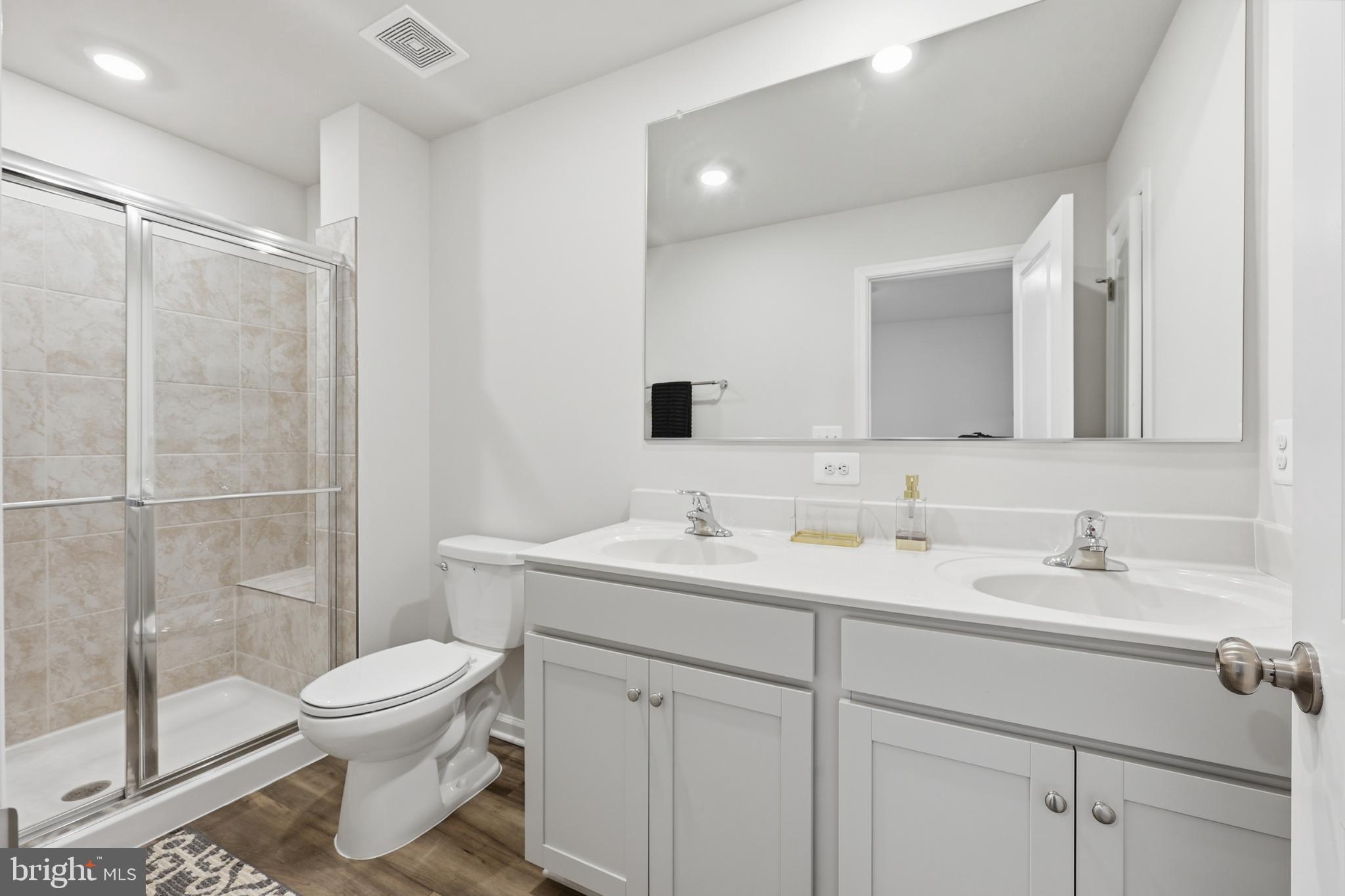 336 Mineral Springs Road Ranson, WV 25438 - Photo 26 of 38 Modern bathroom with sleek finishes.