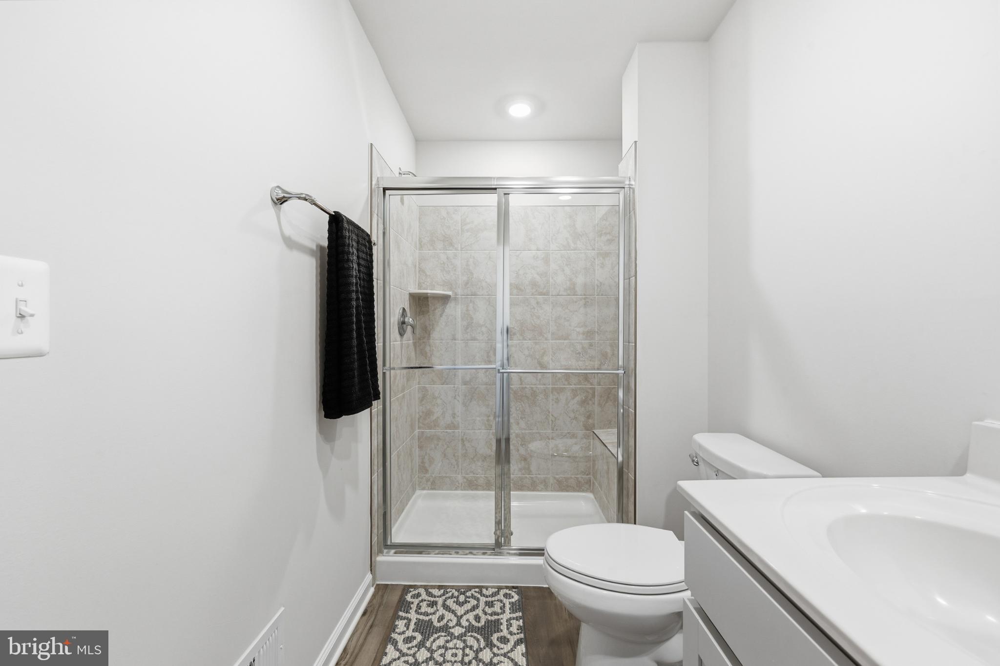 336 Mineral Springs Road Ranson, WV 25438 - Photo 27 of 38 Modern bathroom with sleek glass shower.