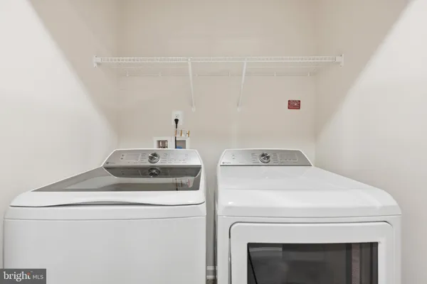 a bathroom with a toilet sink and a shower