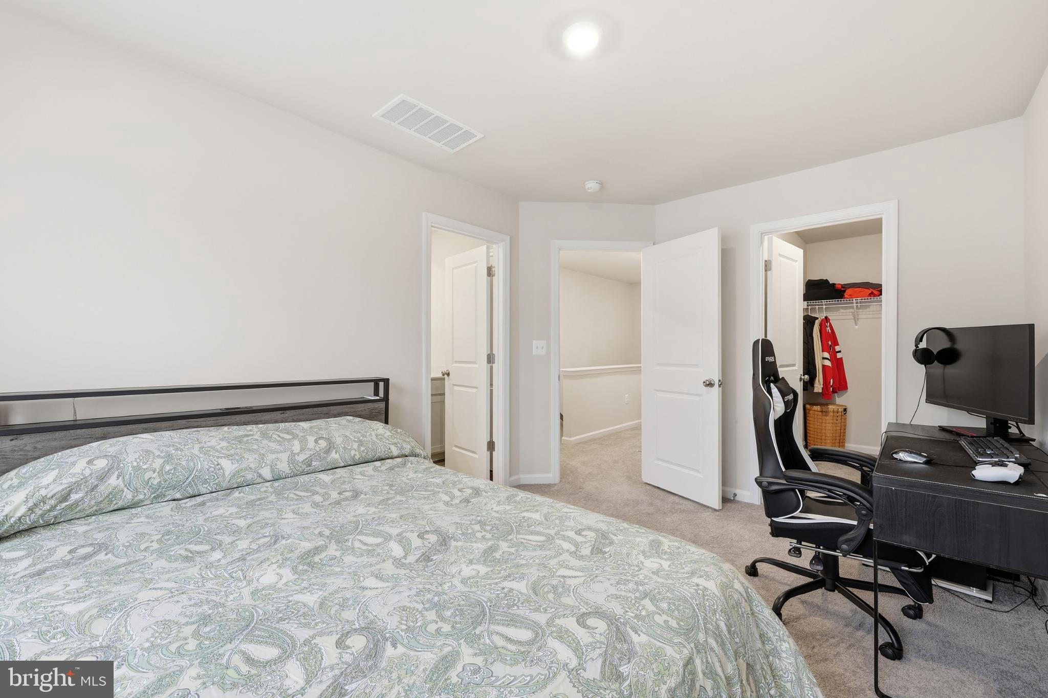 336 Mineral Springs Road Ranson, WV 25438 - Photo 29 of 38 Cozy bedroom with modern workspace.