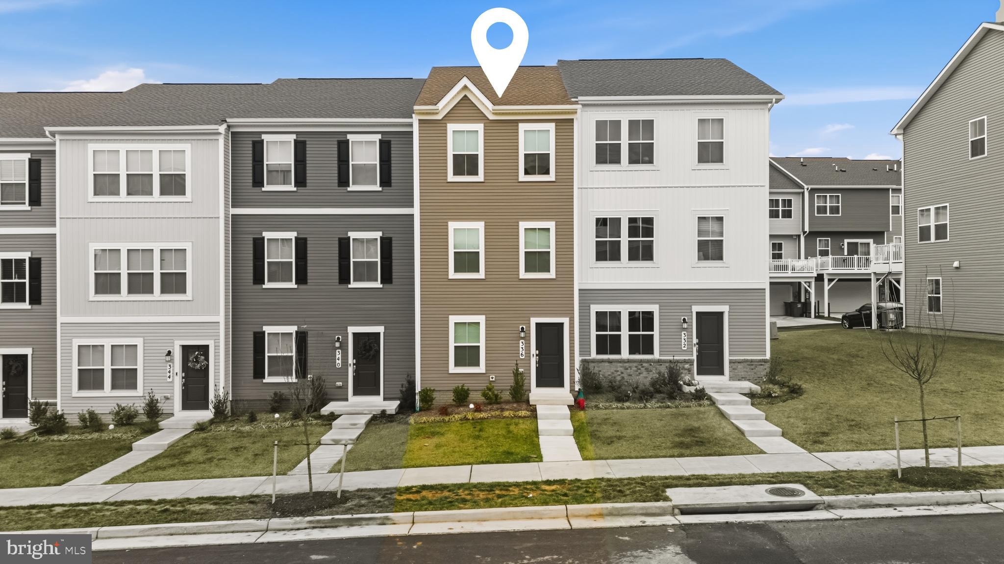 336 Mineral Springs Road Ranson, WV 25438 - Photo 3 of 41 a front view of residential houses
