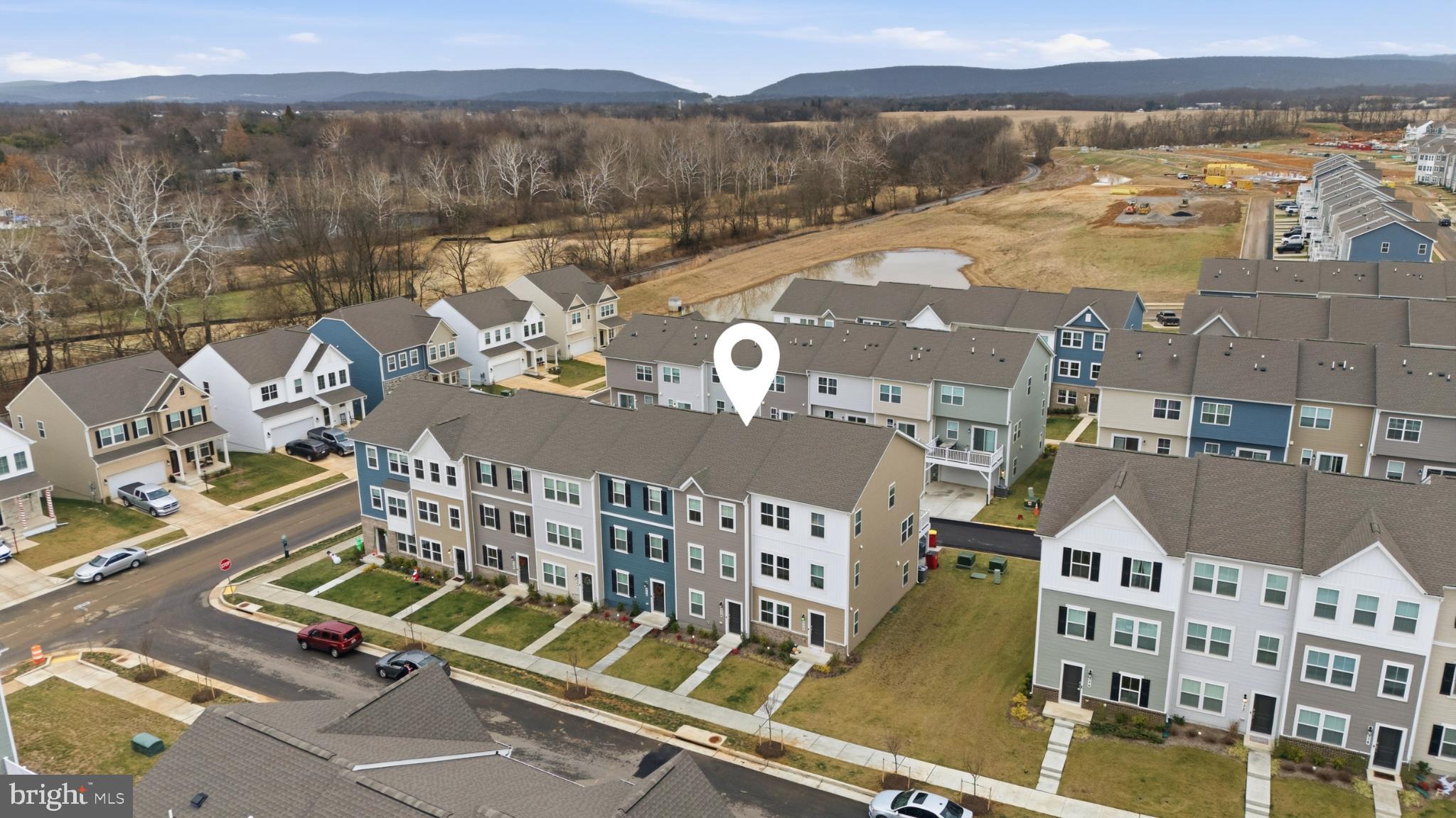 336 Mineral Springs Road Ranson, WV 25438 - Photo 7 of 41 an aerial view of residential houses with outdoor space and river