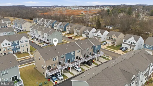 an aerial view of a house with lake view