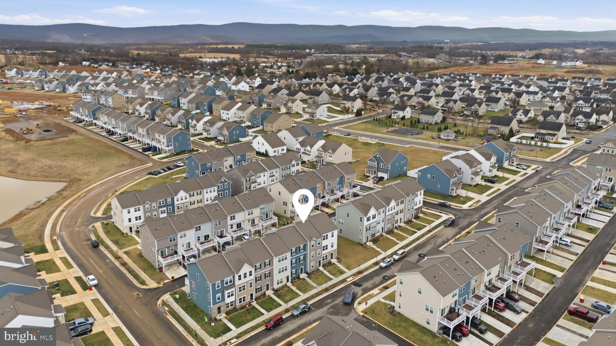 336 Mineral Springs Road Ranson, WV 25438 - Photo 10 of 41 an aerial view of residential building and car parked