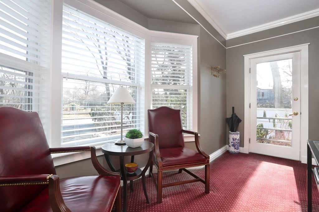40 Windsor Road Newton, MA 02468 - Photo 14 of 29 a view of a dining room with furniture and wooden floor