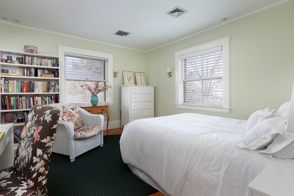 40 Windsor Road Newton, MA 02468 - Photo 19 of 29 a bedroom with a bed and a window