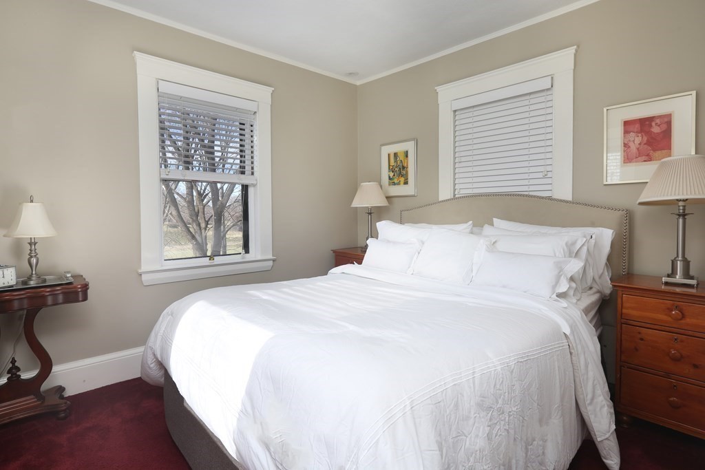 40 Windsor Road Newton, MA 02468 - Photo 20 of 29 a bedroom with a bed and a window
