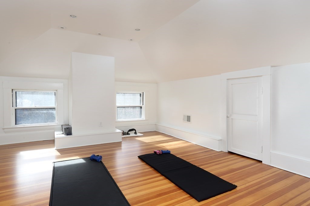 40 Windsor Road Newton, MA 02468 - Photo 23 of 29 a bed room with a bed and a large window
