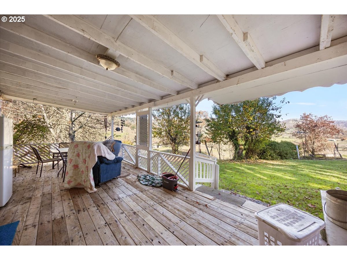 3620 Happy Valley Road Roseburg, OR 97471 - Photo 16 of 25 a view of a couches and table in the patio
