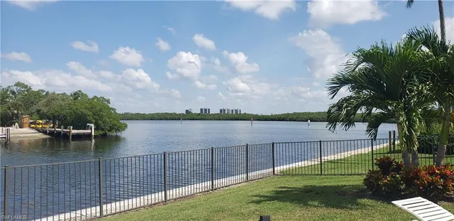 a view of a lake from a yard