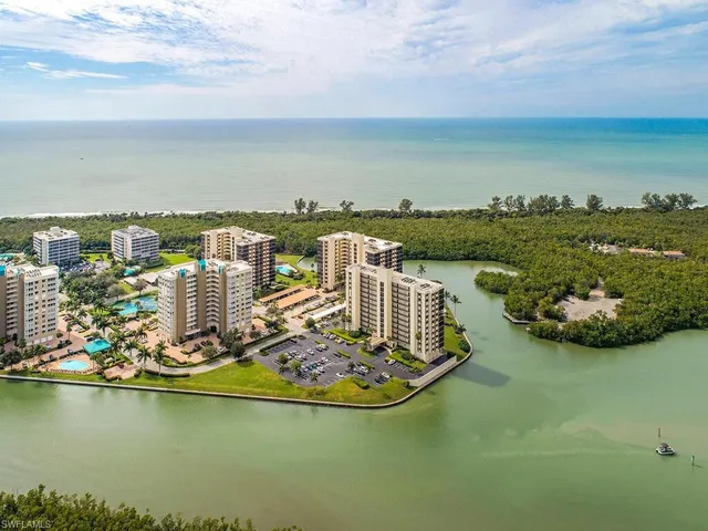 an aerial view of a city with lawn chairs