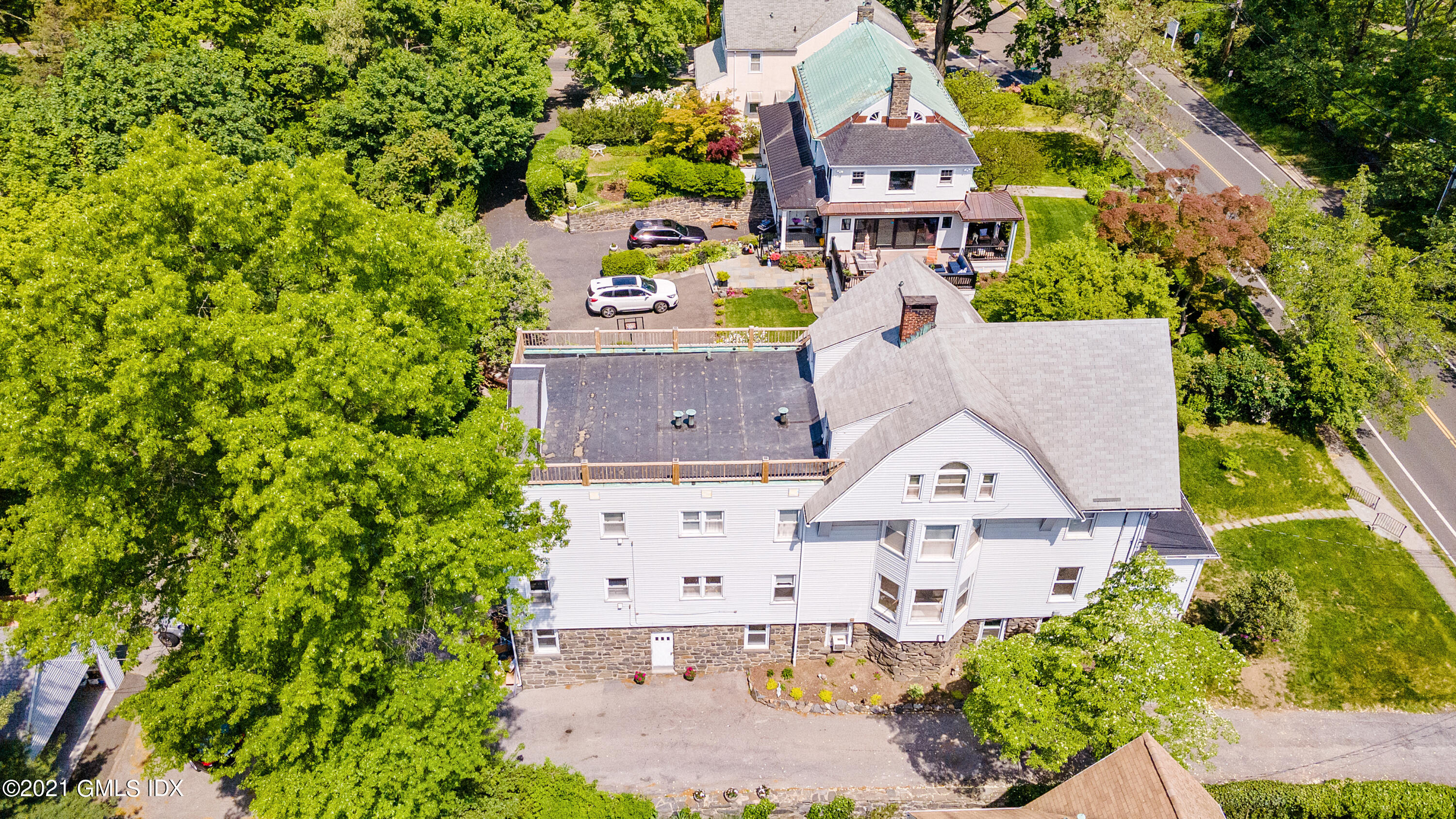 14 Byram Shore Road Greenwich, CT 06830 - Photo 4 of 47 an aerial view of a house
