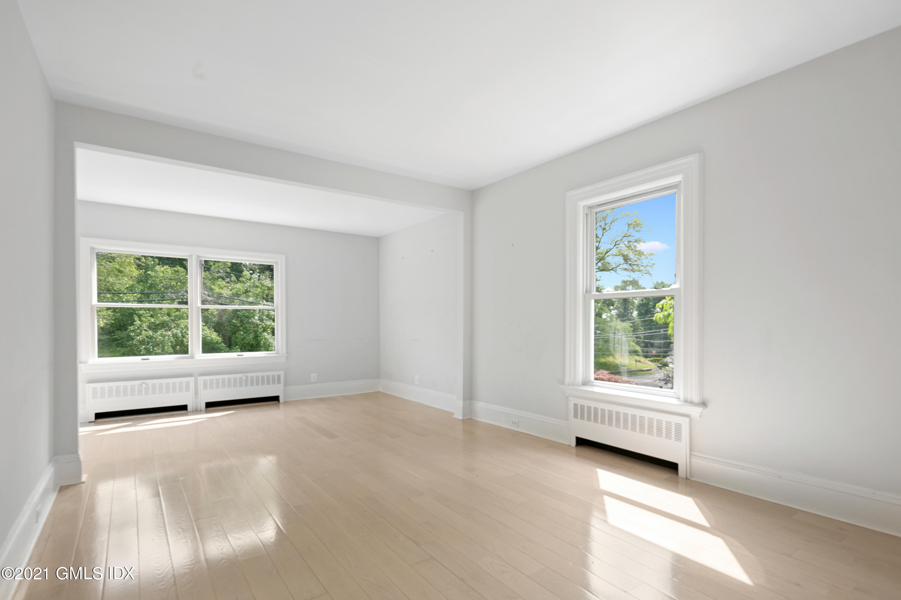 14 Byram Shore Road Greenwich, CT 06830 - Photo 10 of 47 a view of an empty room with a window