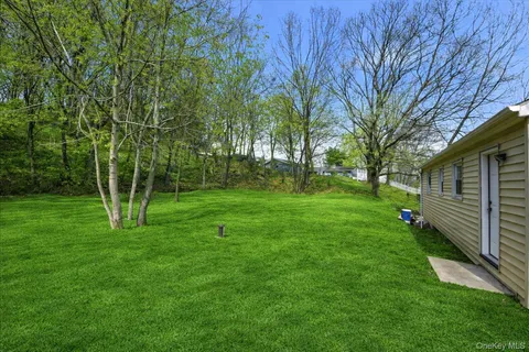 a view of a backyard with a garden