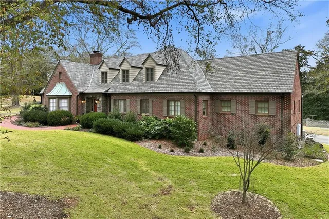 a view of a house with a garden
