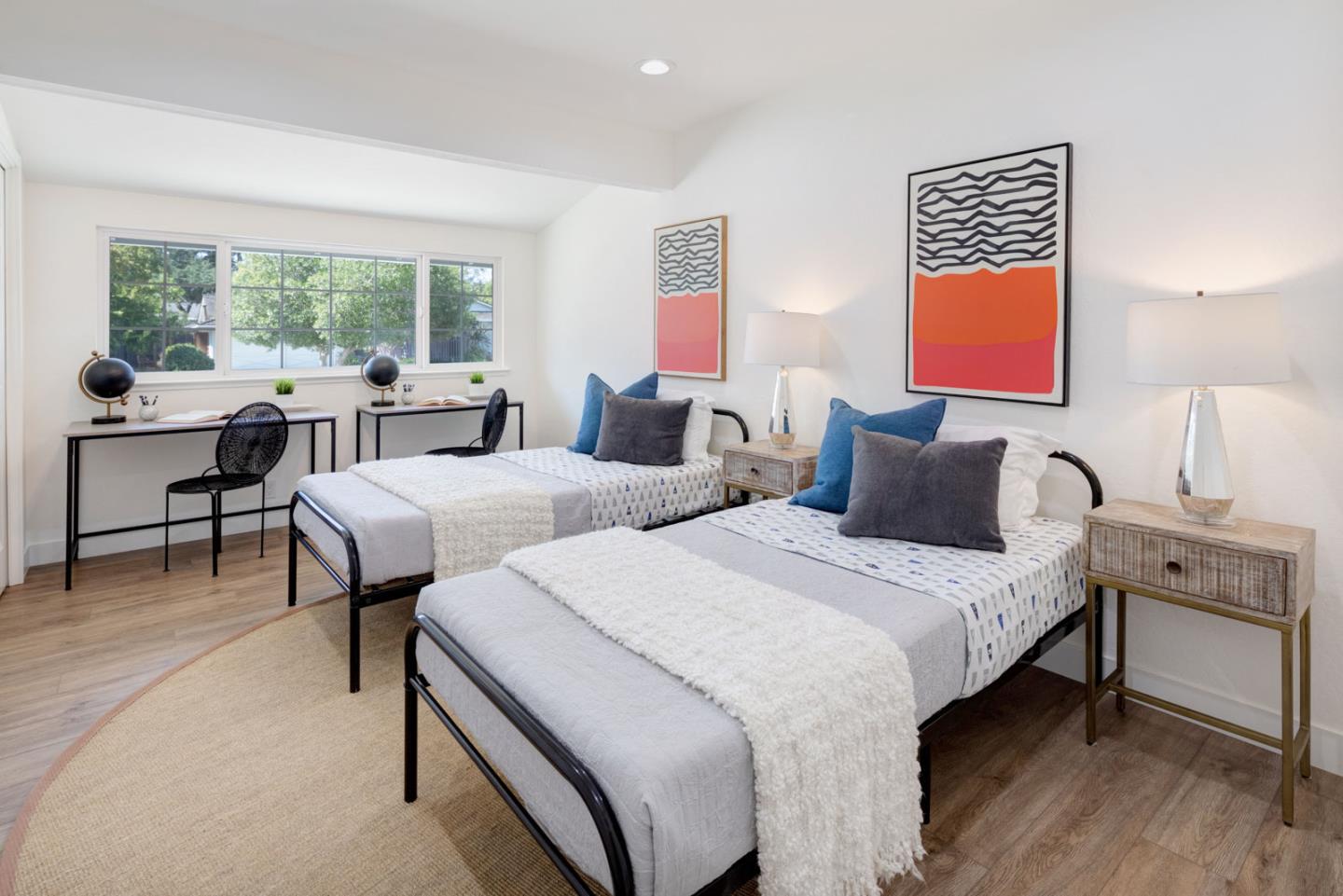 1650 Manitoba Drive Sunnyvale, CA 94087 - Photo 21 of 26 a spacious bedroom with two beds and a large window