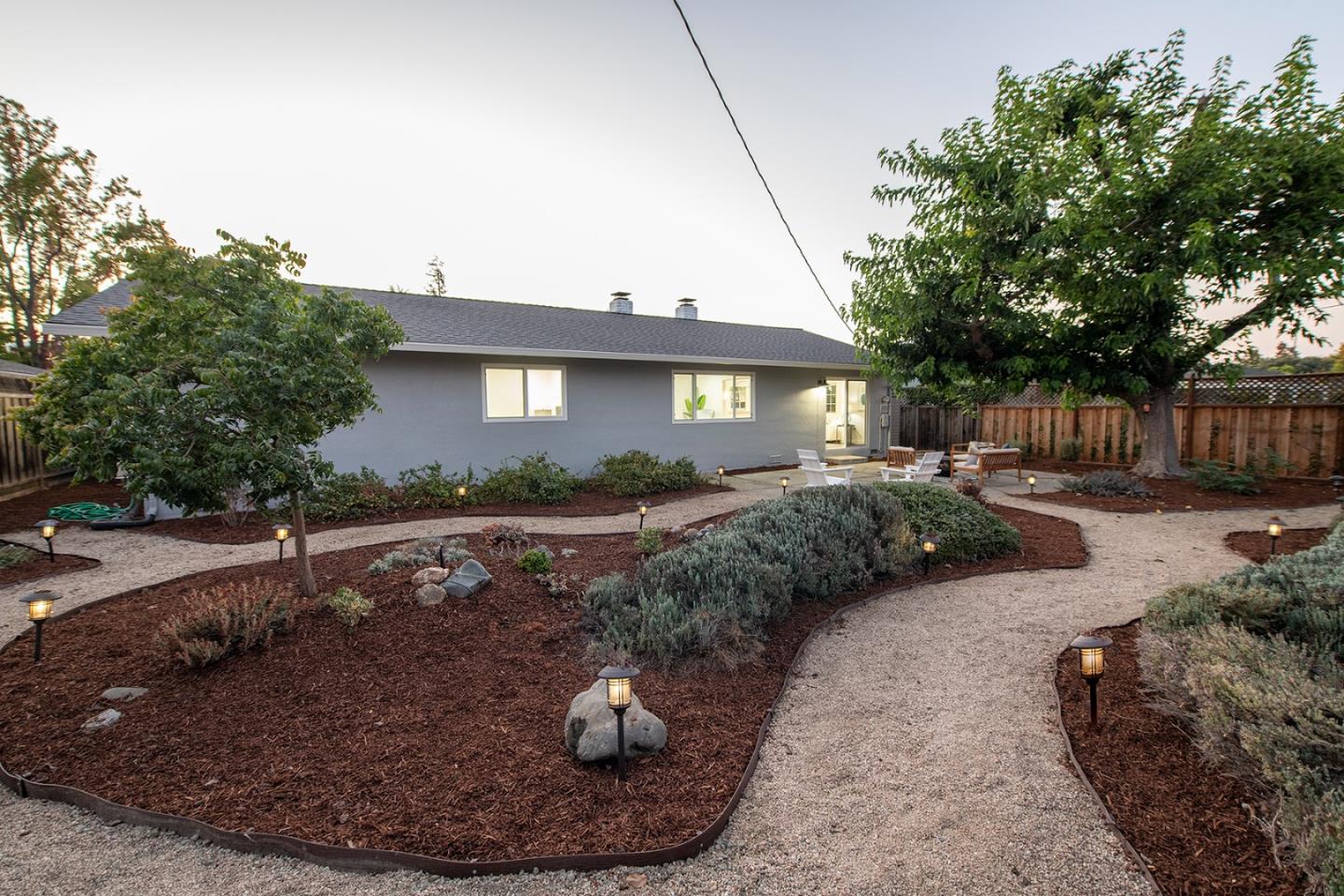 1650 Manitoba Drive Sunnyvale, CA 94087 - Photo 26 of 26 a view of a house with a yard and potted plants