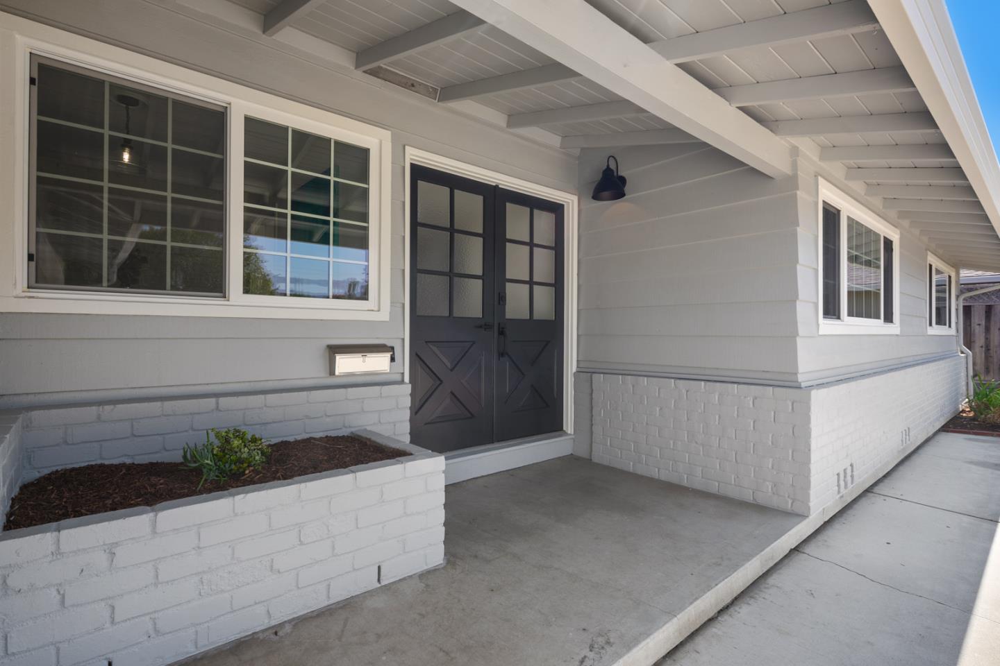 1650 Manitoba Drive Sunnyvale, CA 94087 - Photo 3 of 26 a view of front door and potted plants