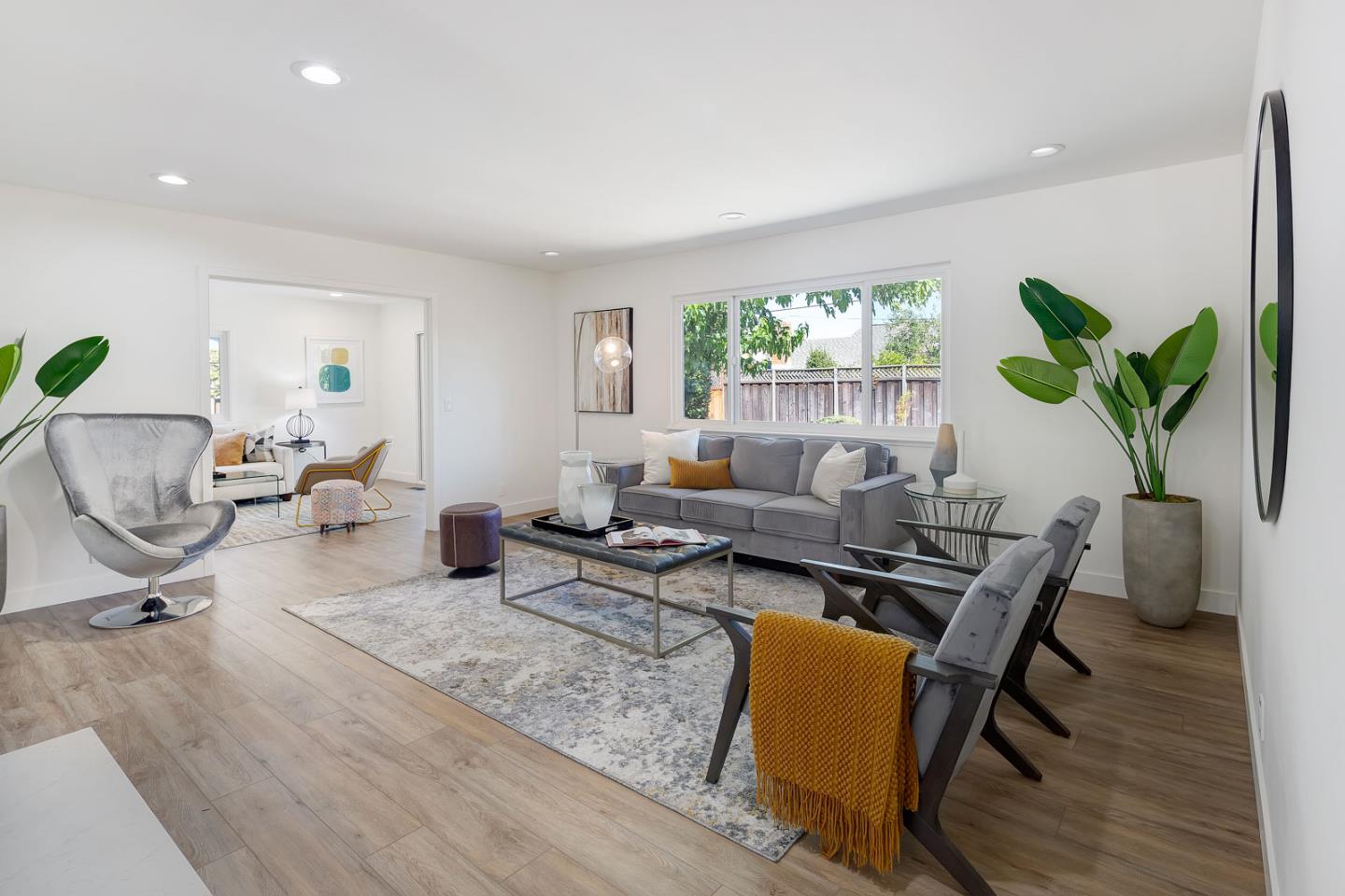 1650 Manitoba Drive Sunnyvale, CA 94087 - Photo 5 of 26 a living room with furniture and a potted plant