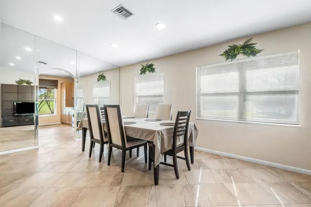 a view of a dining room with furniture
