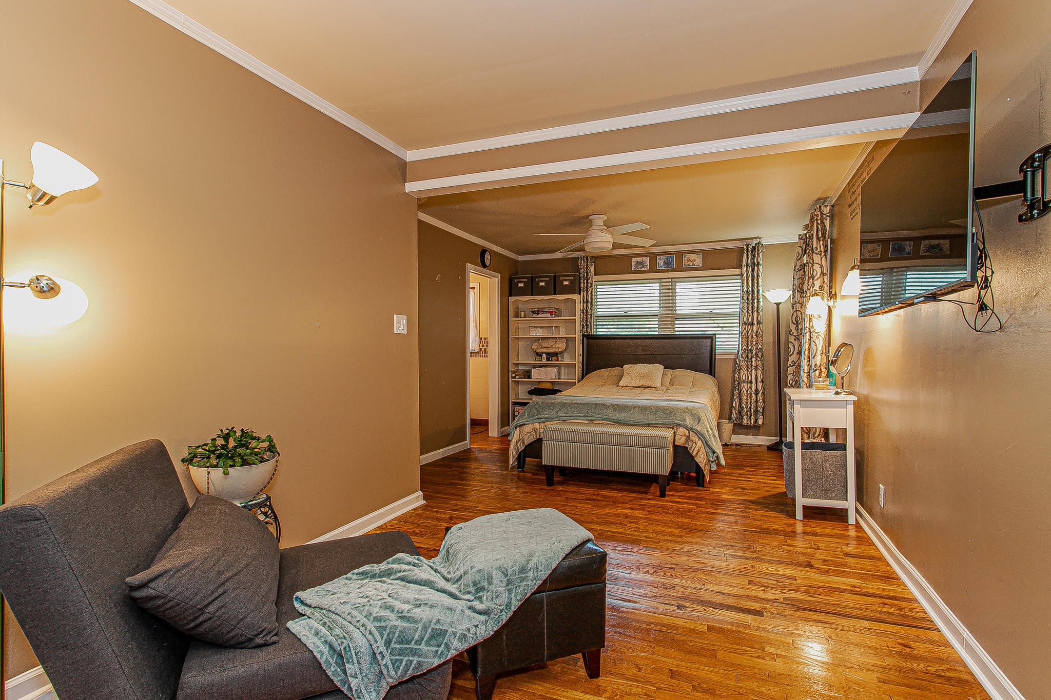 4409 Deerfield Road Knoxville, TN 37921 - Photo 18 of 40 a bedroom with a bed and wooden floor