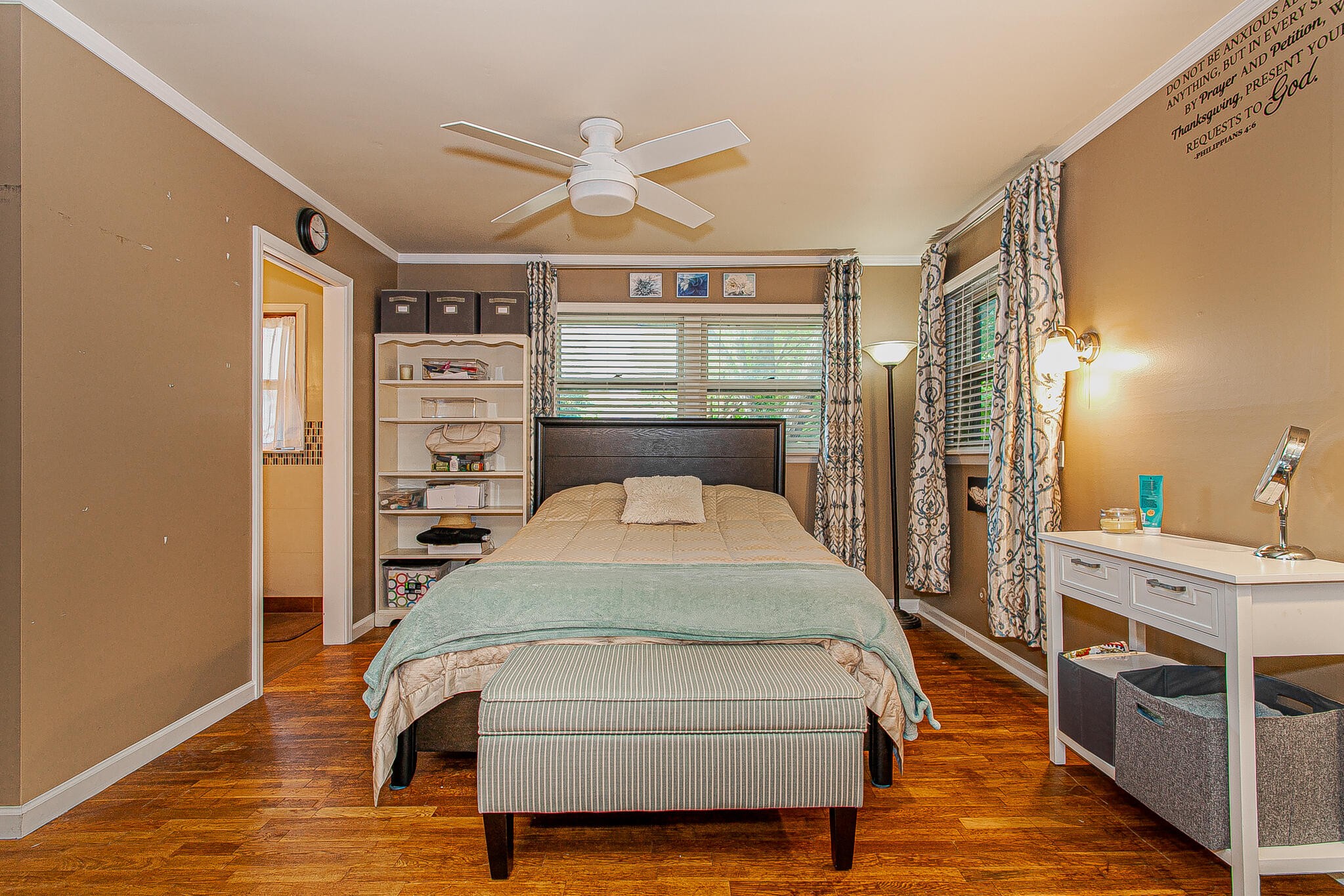 4409 Deerfield Road Knoxville, TN 37921 - Photo 19 of 40 a spacious bedroom with a bed and a chandelier