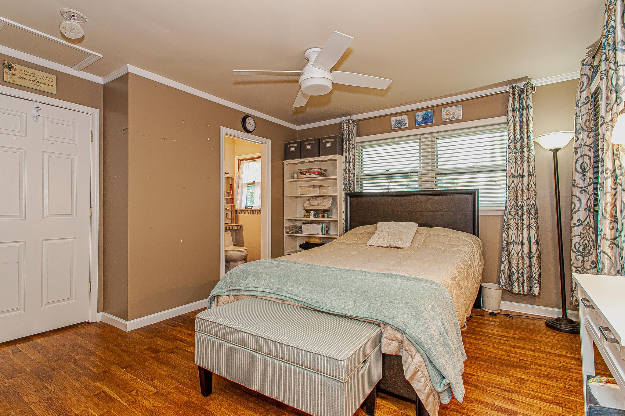 4409 Deerfield Road Knoxville, TN 37921 - Photo 20 of 40 a bedroom with a bed and wooden floor
