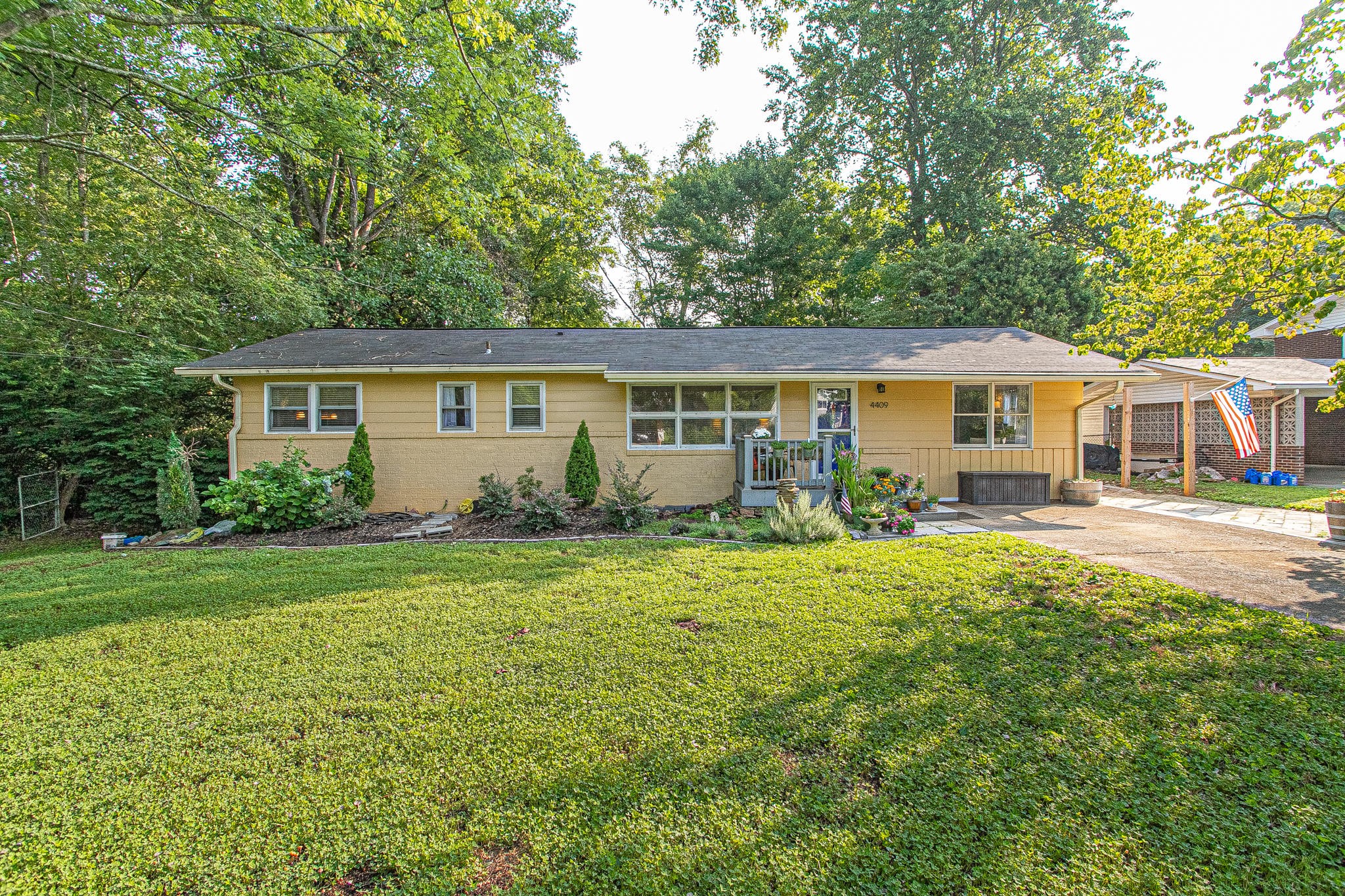 4409 Deerfield Road Knoxville, TN 37921 - Photo 2 of 40 a view of a house with backyard and garden