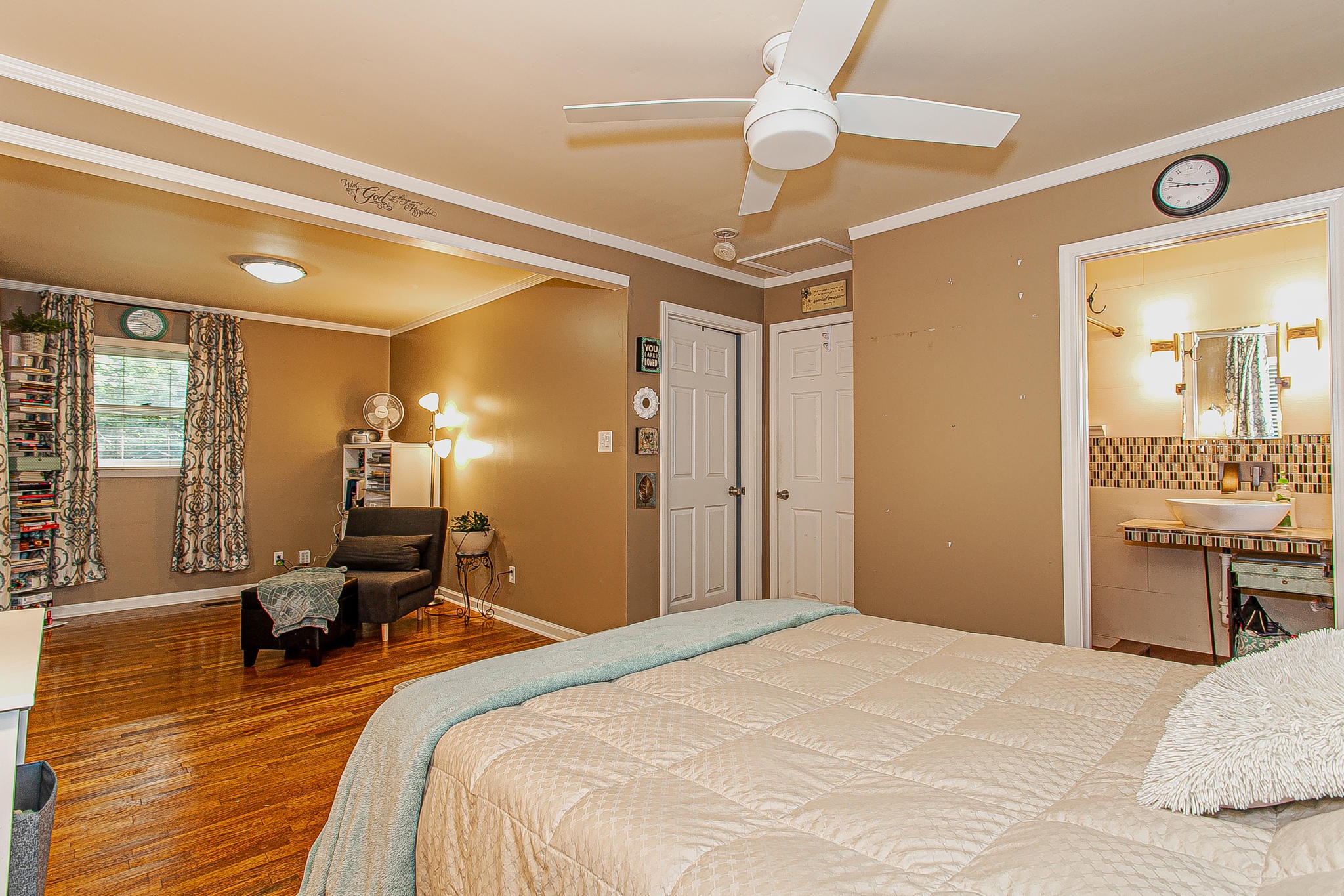 4409 Deerfield Road Knoxville, TN 37921 - Photo 22 of 40 a bedroom with a bed and wooden floor