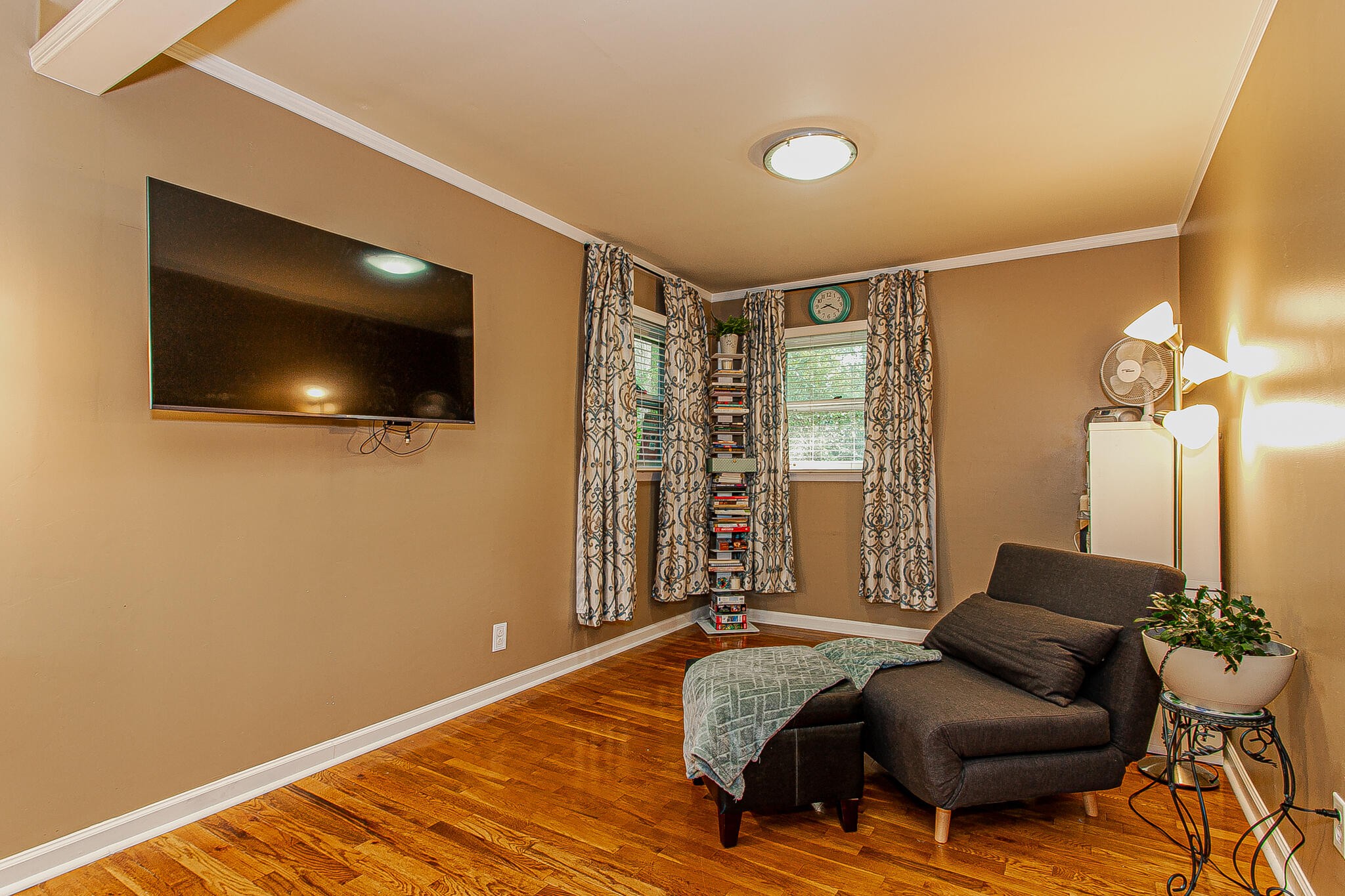 4409 Deerfield Road Knoxville, TN 37921 - Photo 24 of 40 a bedroom with a bed and a flat screen tv