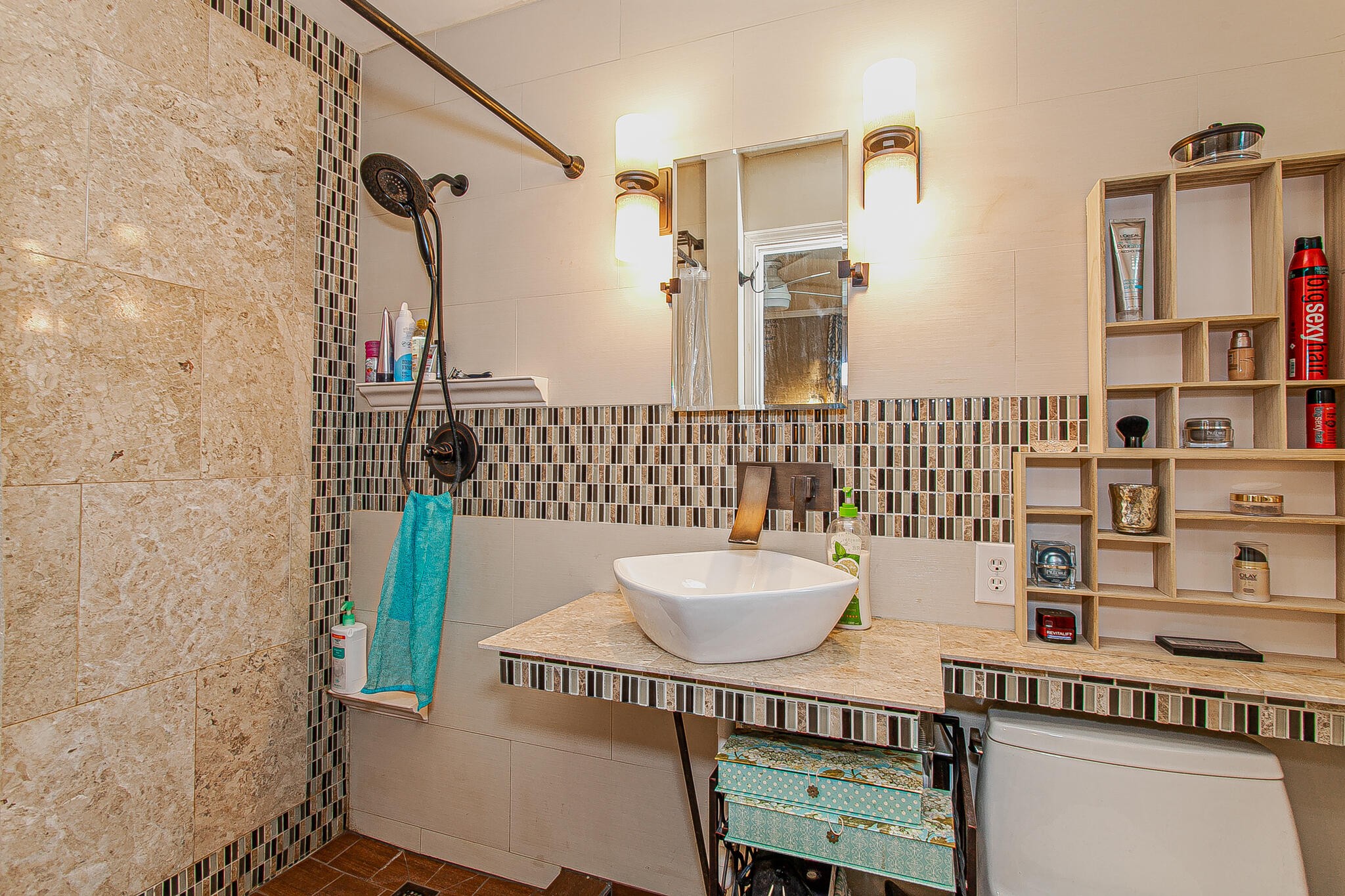 4409 Deerfield Road Knoxville, TN 37921 - Photo 25 of 40 a bathroom with a sink a toilet and shower