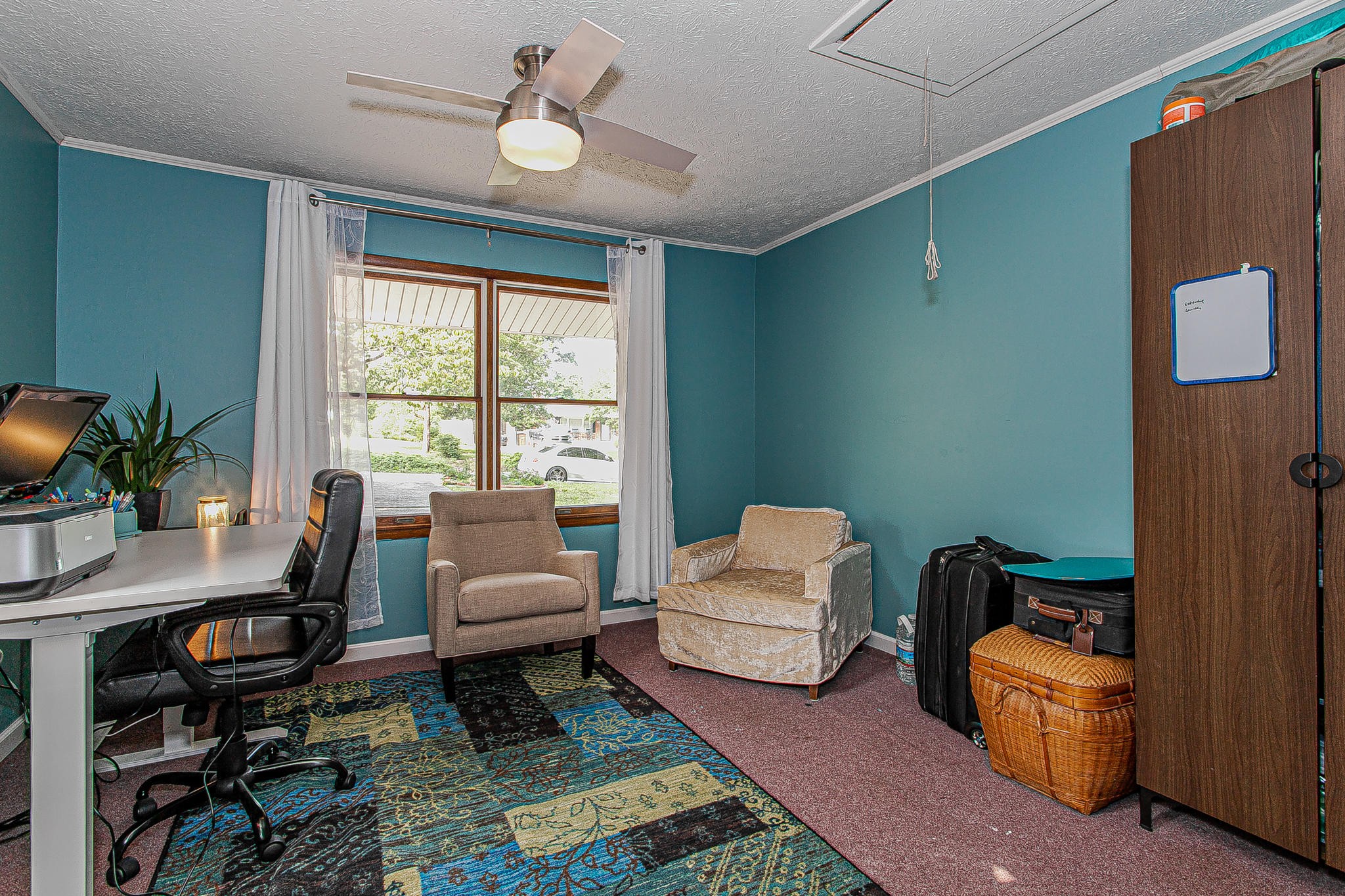 4409 Deerfield Road Knoxville, TN 37921 - Photo 27 of 40 a living room with furniture a rug and a window