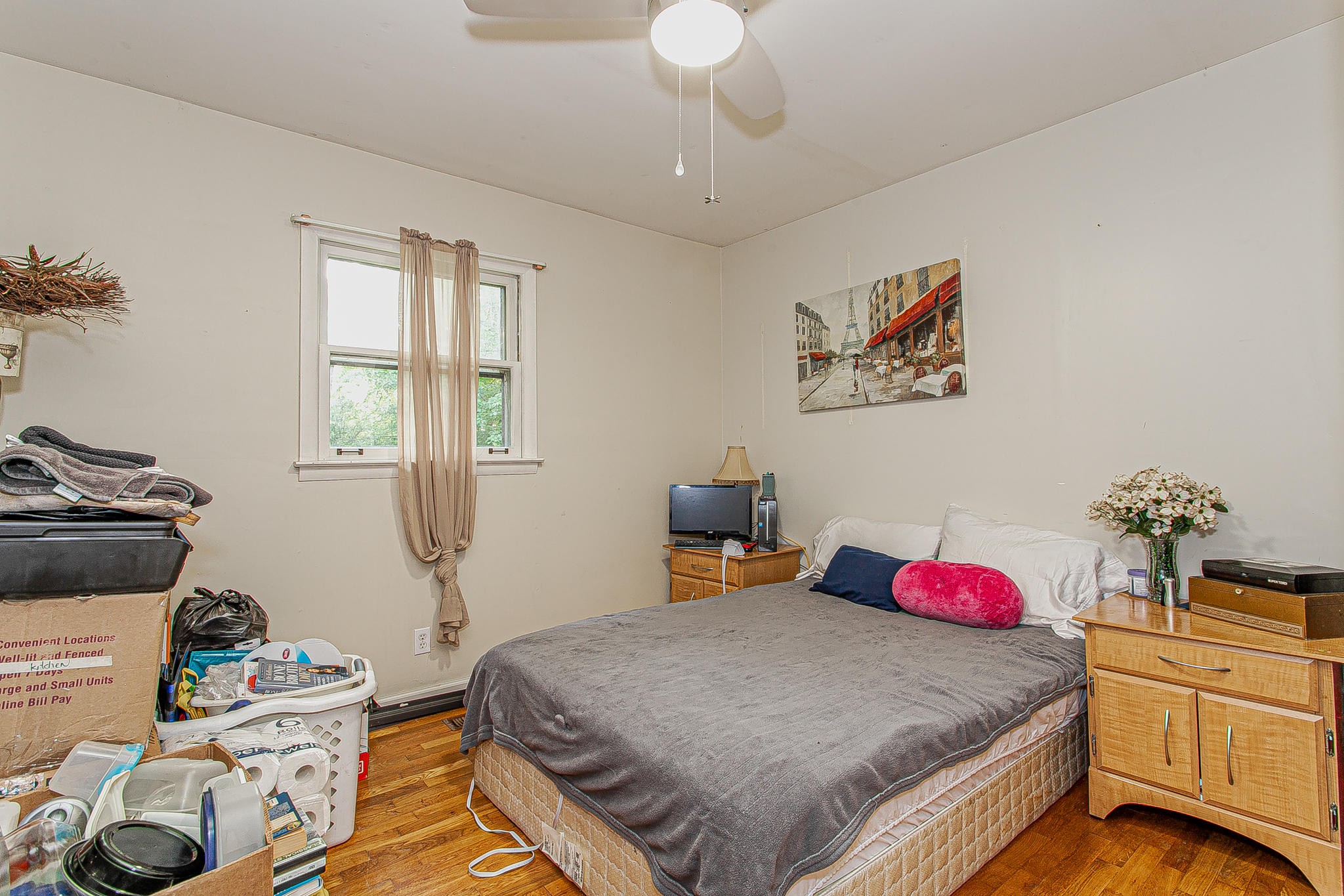 4409 Deerfield Road Knoxville, TN 37921 - Photo 31 of 40 a bedroom with a bed and dresser